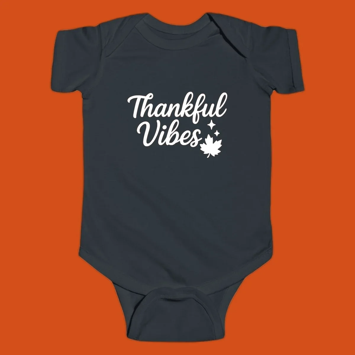 Thankful Vibes text with fall maple leaf and sparkles graphic.
