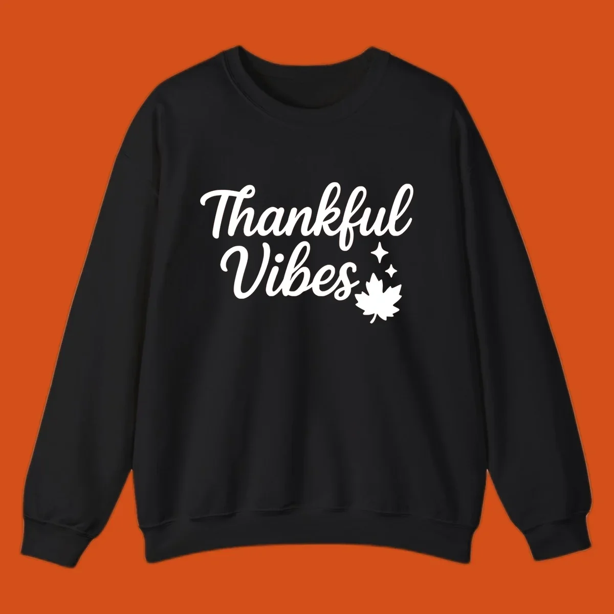 Thankful Vibes text with fall maple leaf and sparkles graphic.