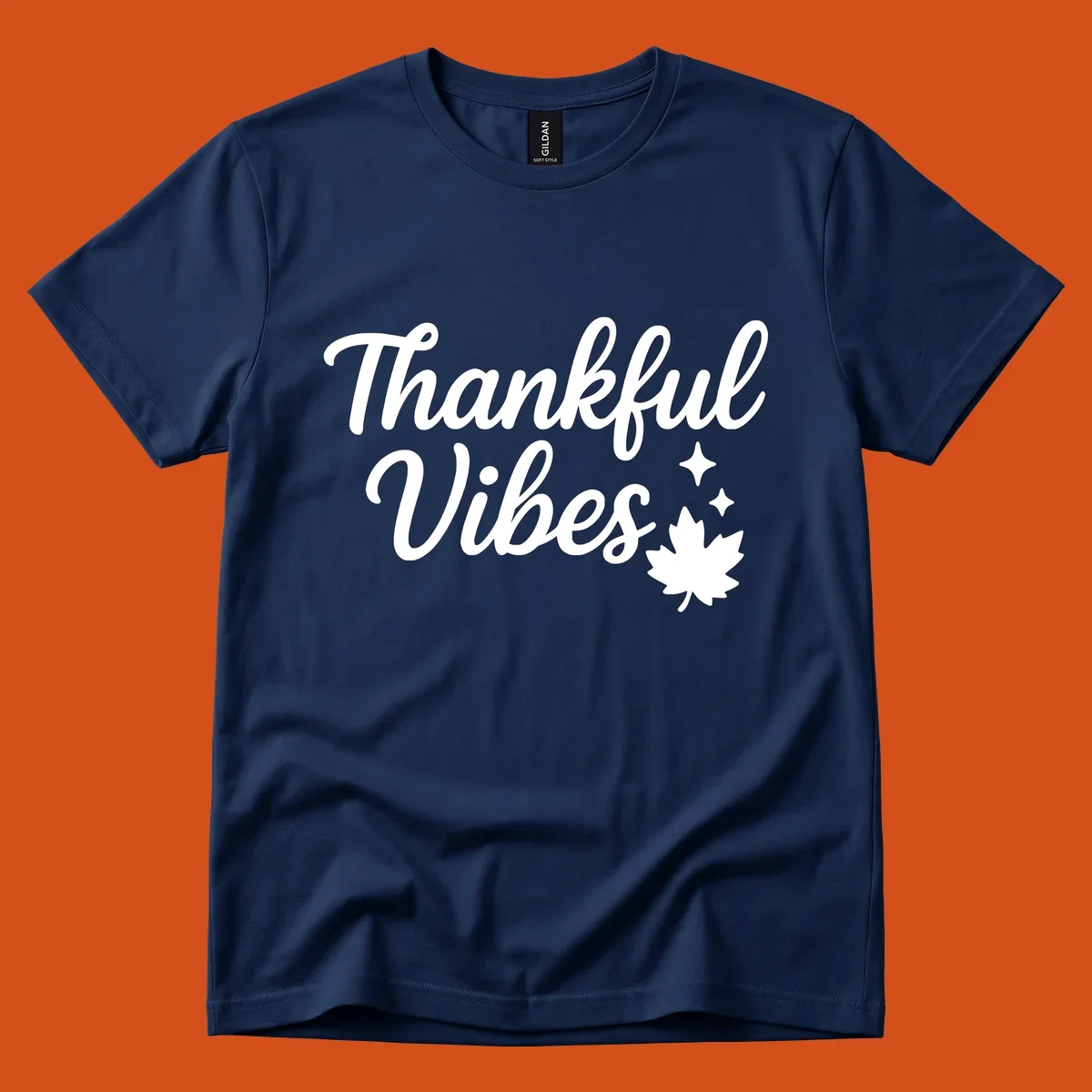 Thankful Vibes text with fall maple leaf and sparkles graphic.