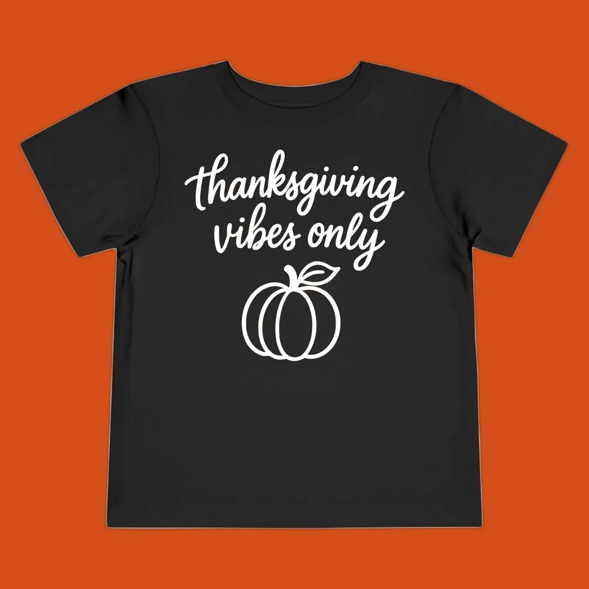 Thanksgiving vibes only text with a pumpkin graphic. Thanksgiving-vibes-only.