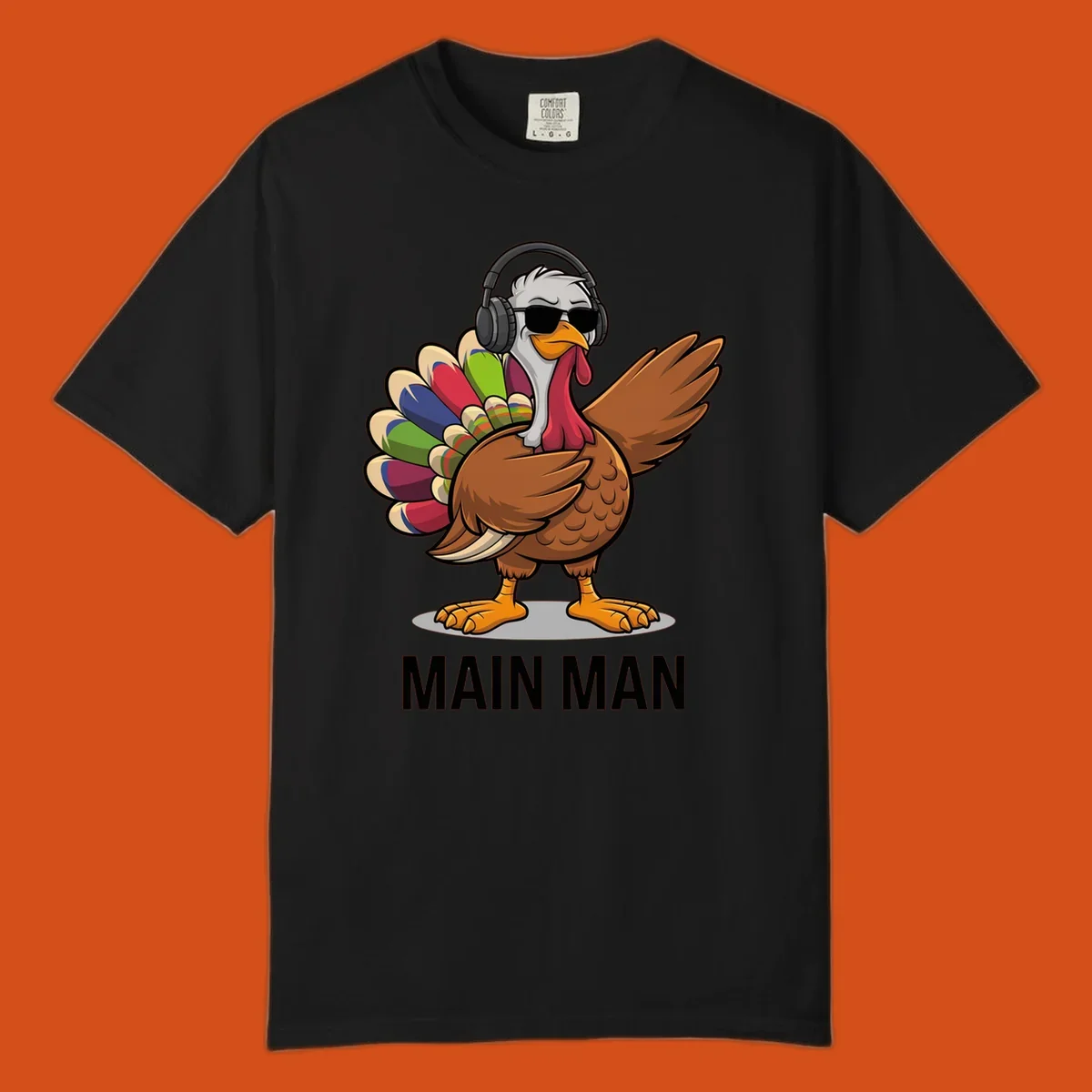 Thanksgiving turkey doing a dab, wearing headphones and sunglasses, with text 'MAIN MAN'.