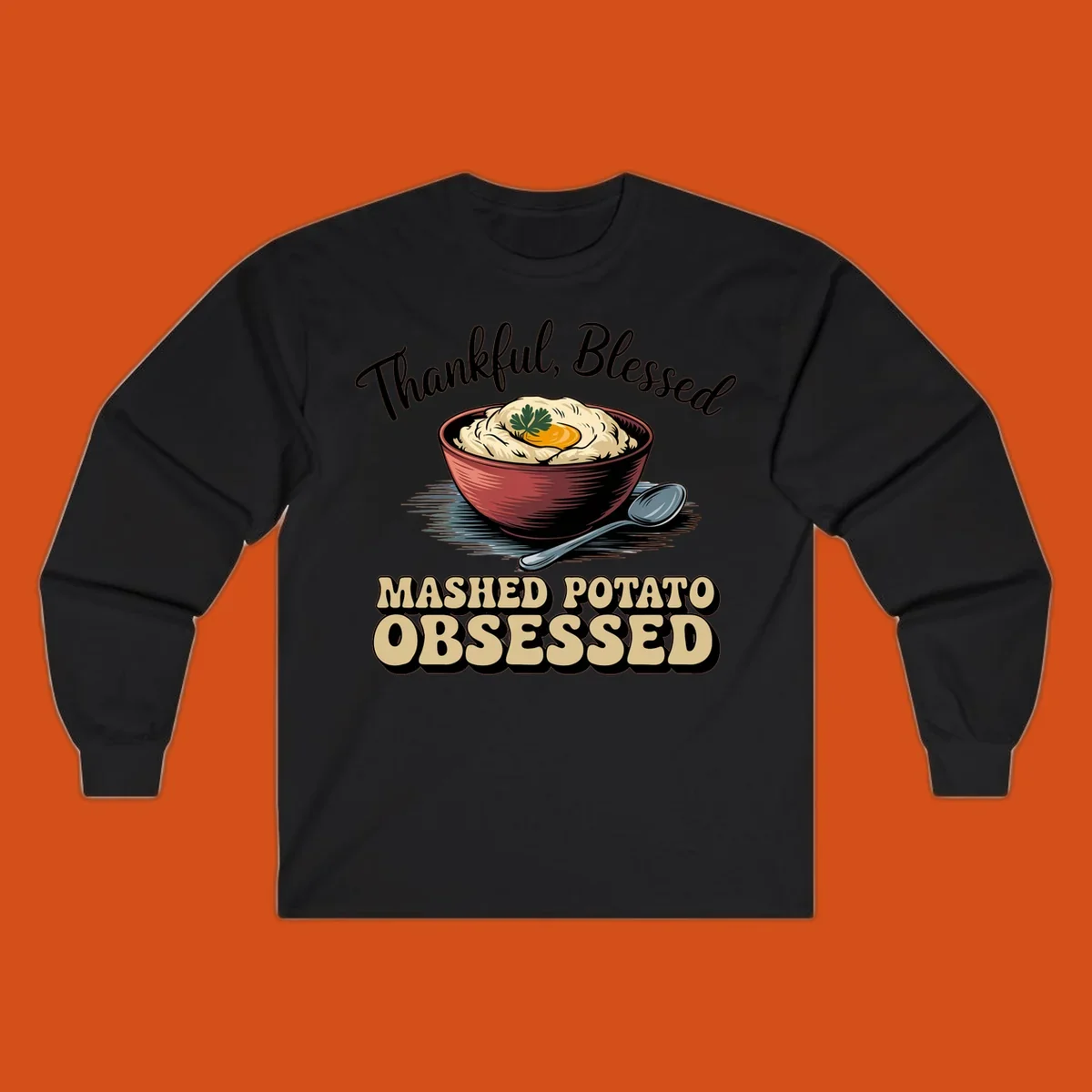 Mashed potato obsessed thankful blessed text with illustration of mashed potatoes and spoon.