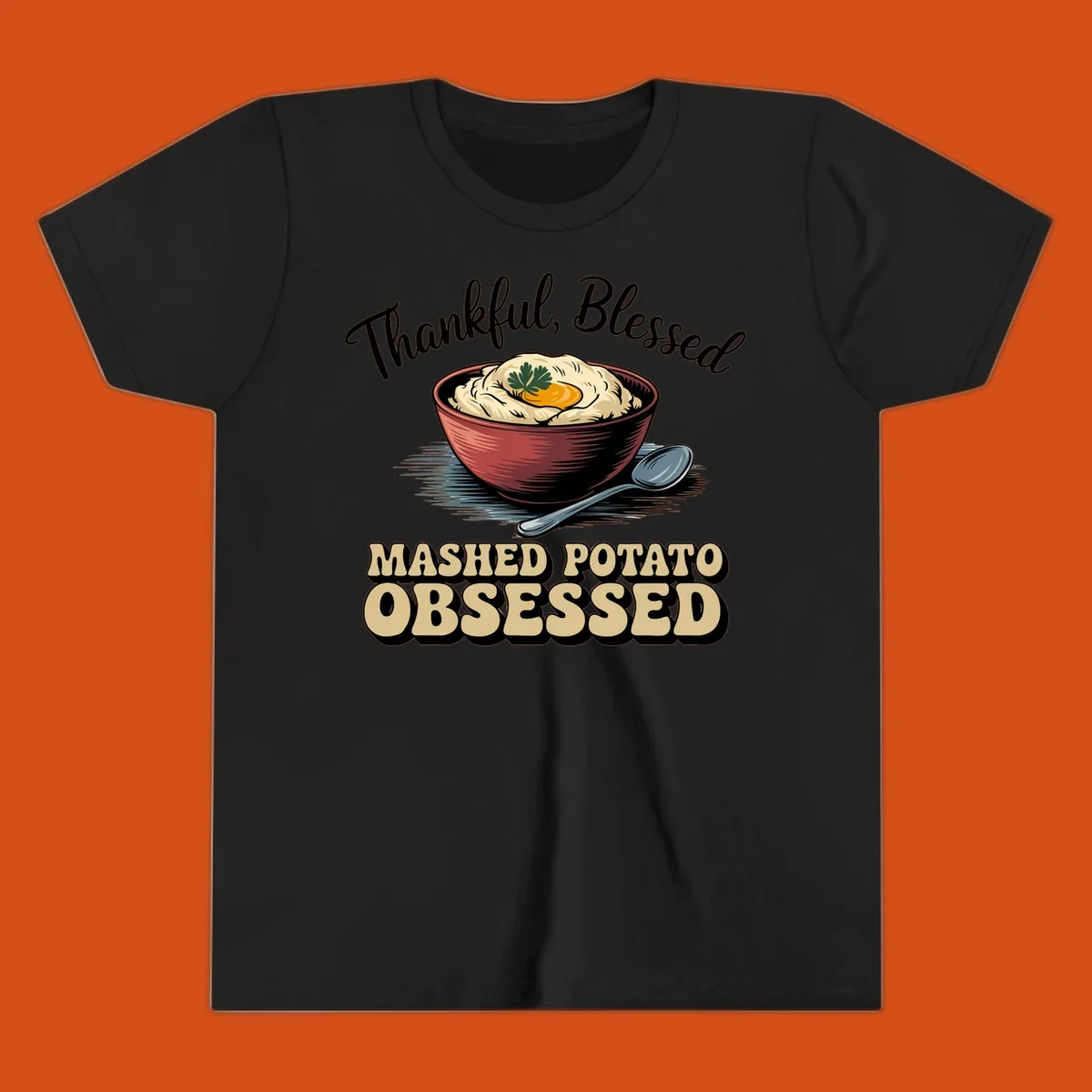 Mashed potato obsessed thankful blessed text with illustration of mashed potatoes and spoon.