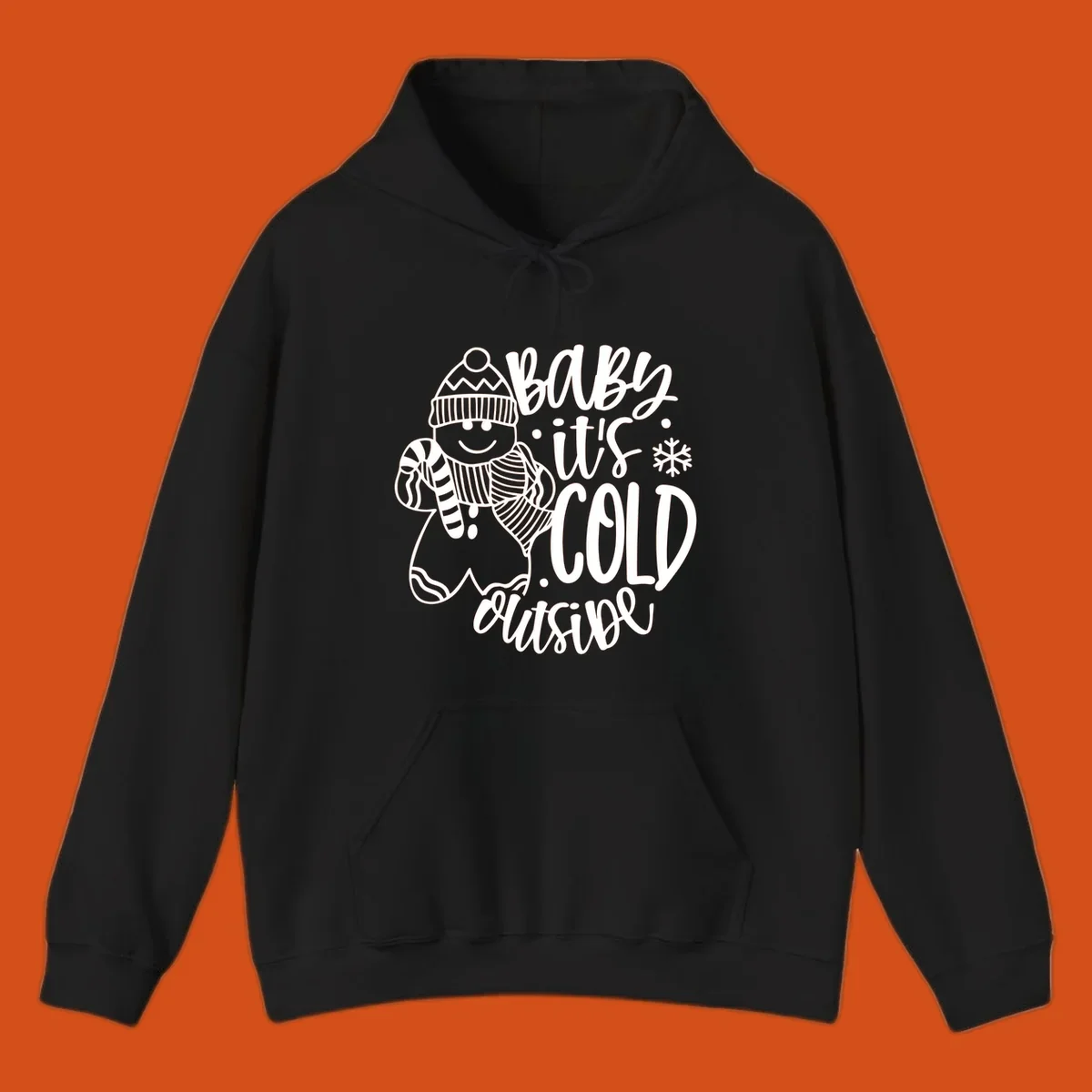 Baby it's cold outside gingerbread man with snowflake graphic.
