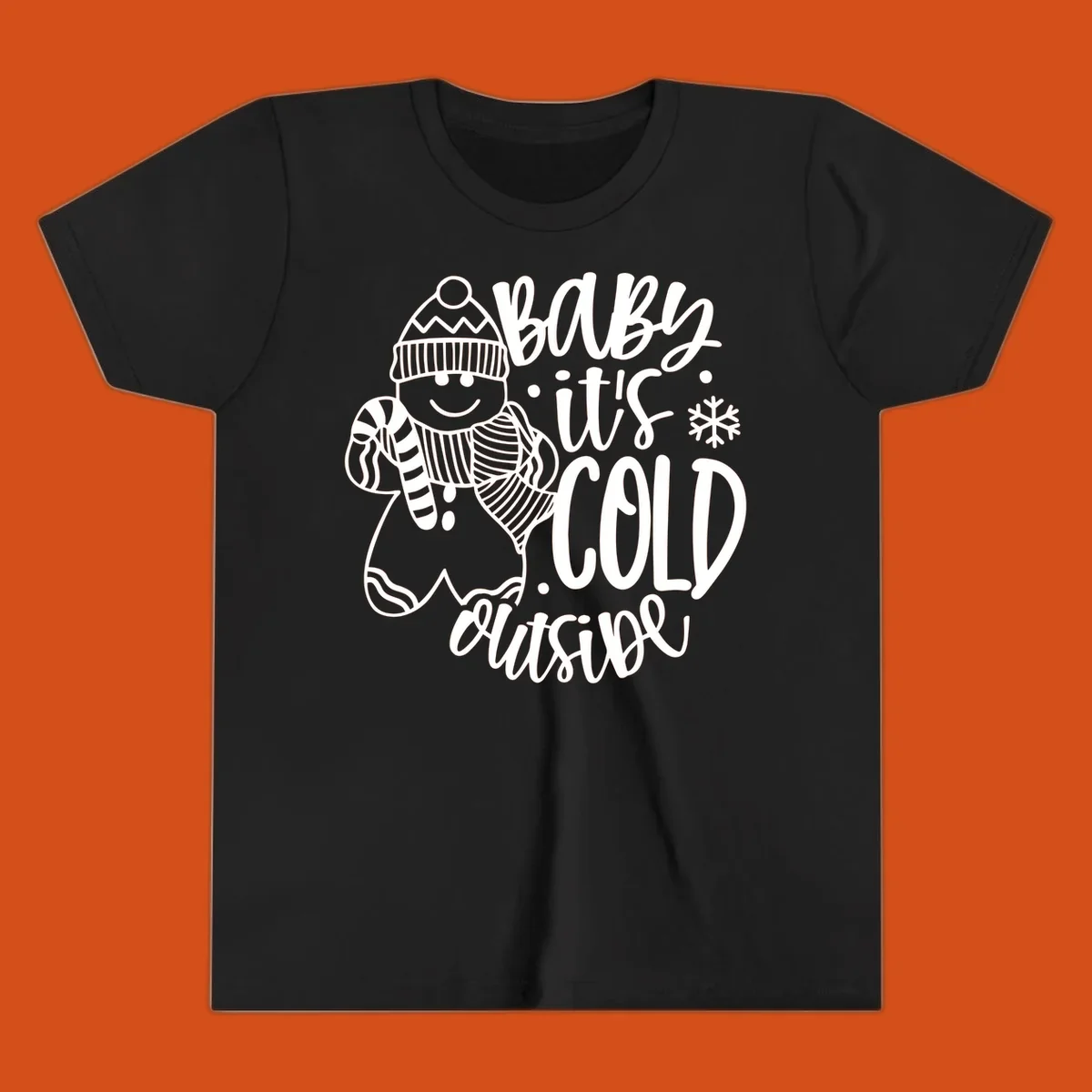 Baby it's cold outside gingerbread man with snowflake graphic.