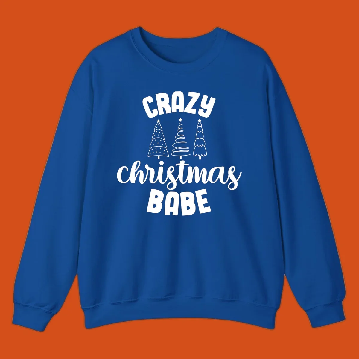 Crazy Christmas Babe text with three Christmas trees illustration.
