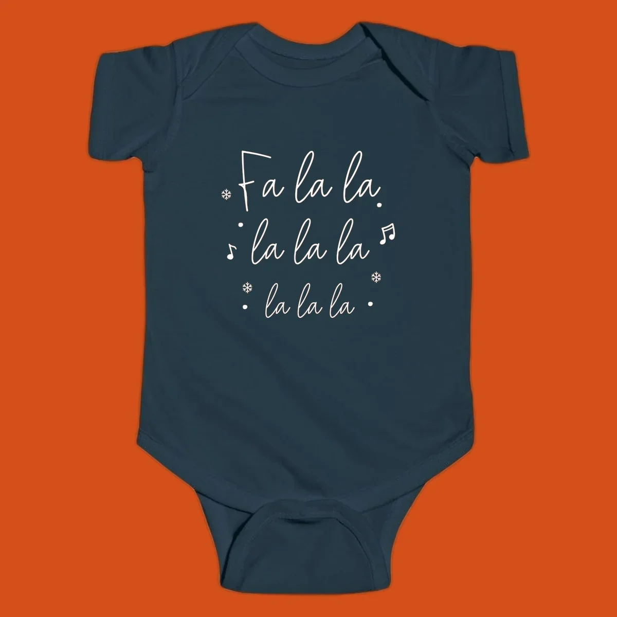 Fa la la Christmas carol lyrics with snowflakes and music notes