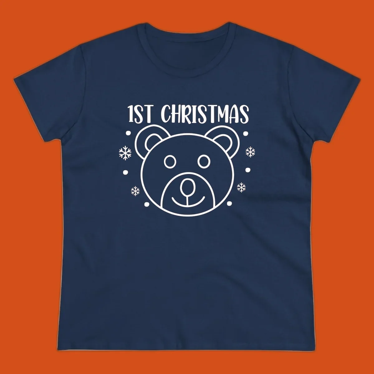 Baby's first christmas bear graphic with text and snowflakes.