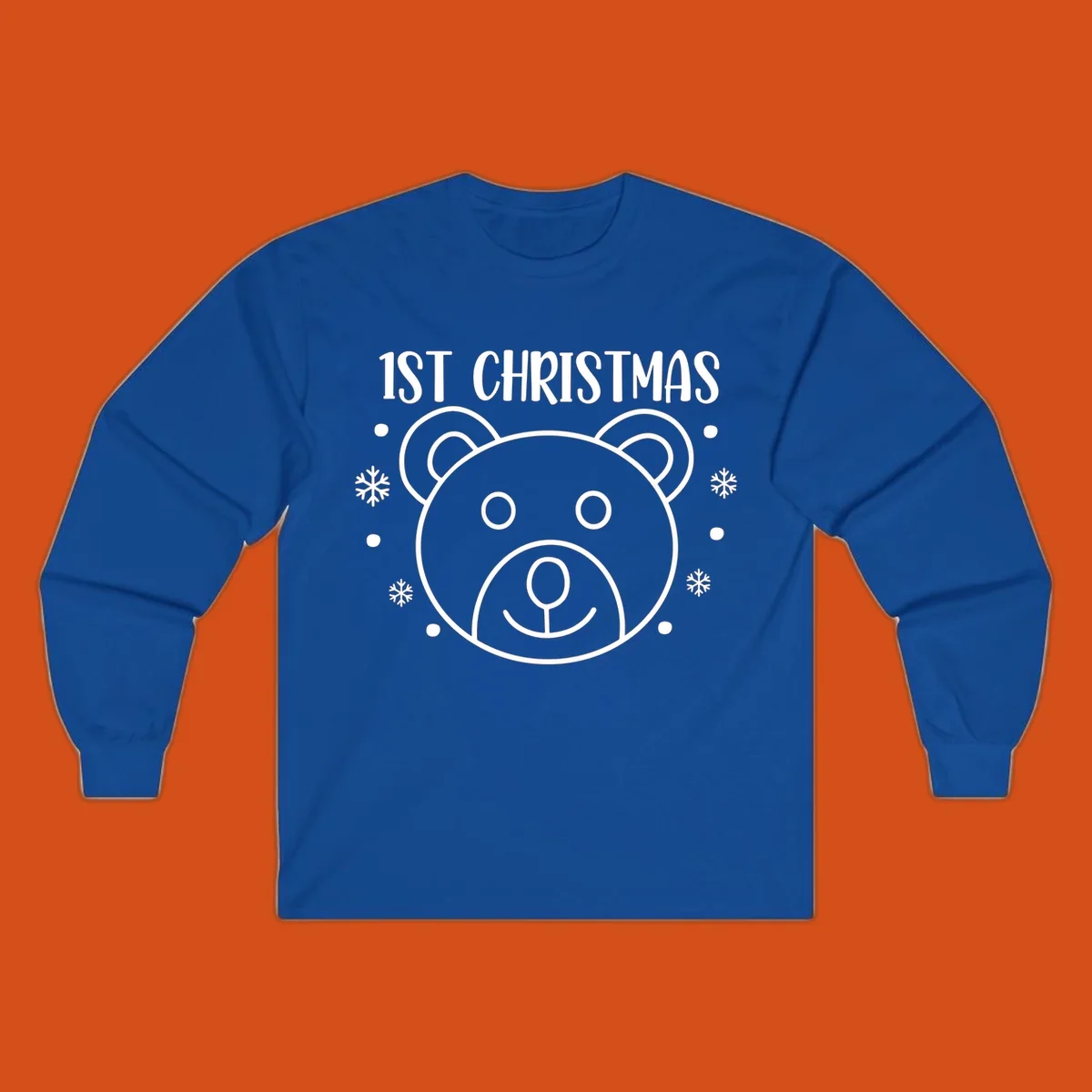 Baby's first christmas bear graphic with text and snowflakes.