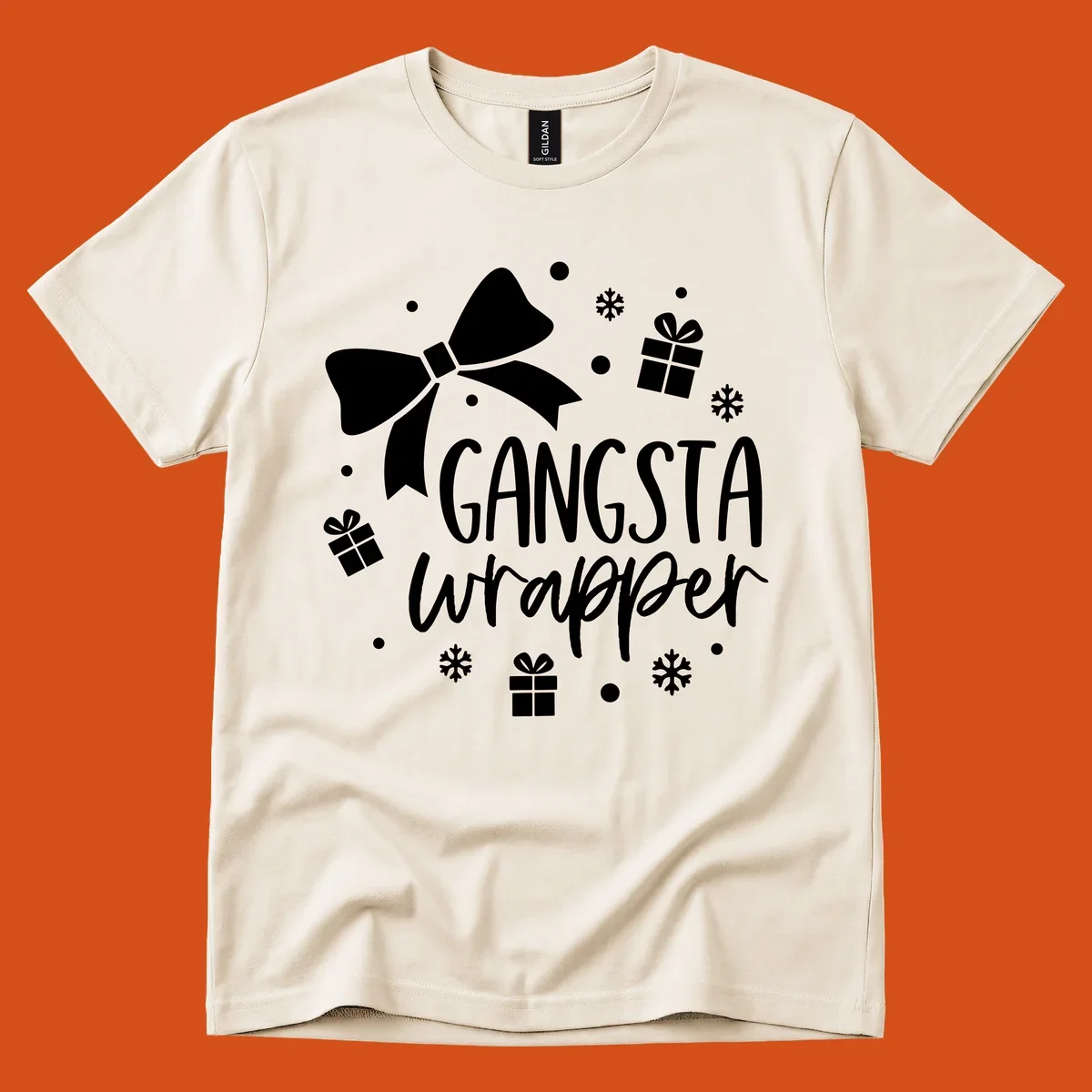 Gangsta wrapper holiday design with text, bow, gifts, and snowflakes.