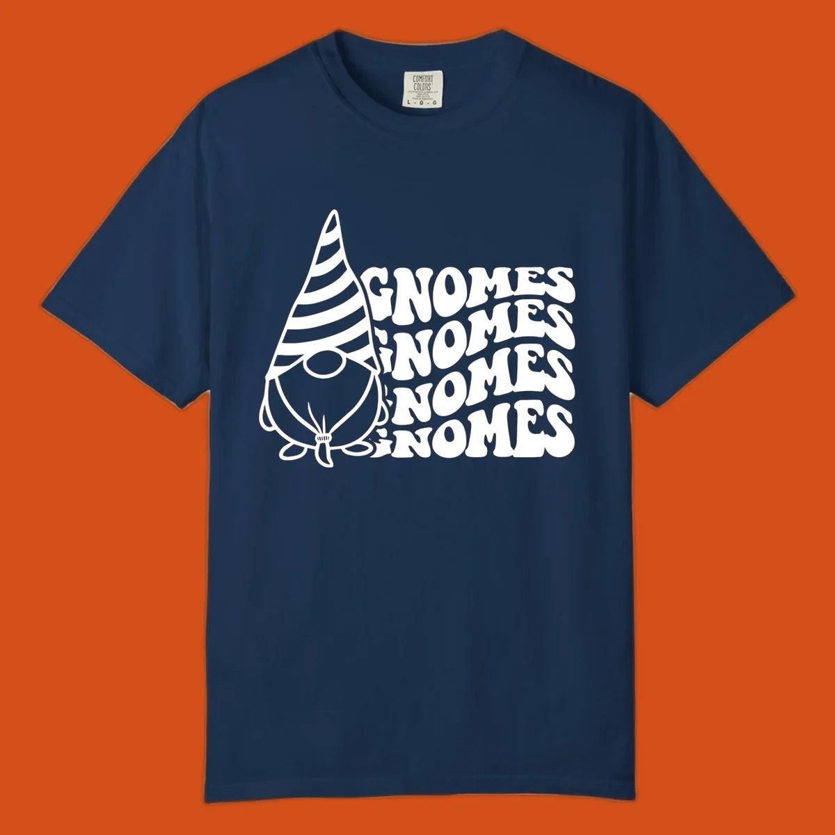 Gnome illustration with repeating wavy text that says GNOMES. Retro style graphic tee.