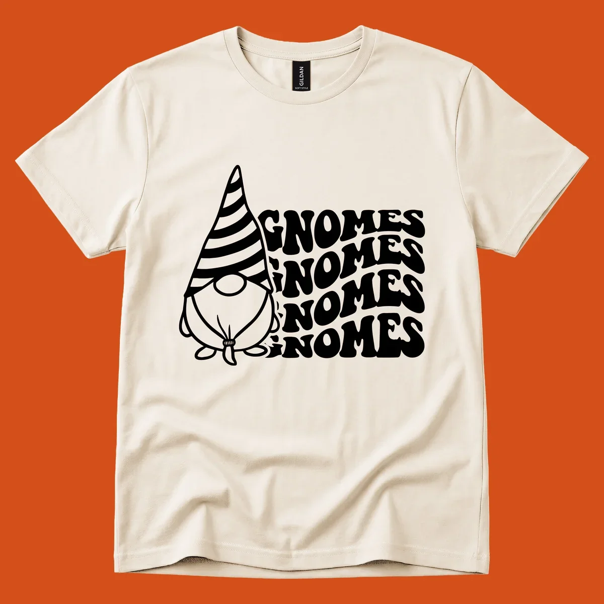 Gnome illustration with repeating wavy text that says GNOMES. Retro style graphic tee.