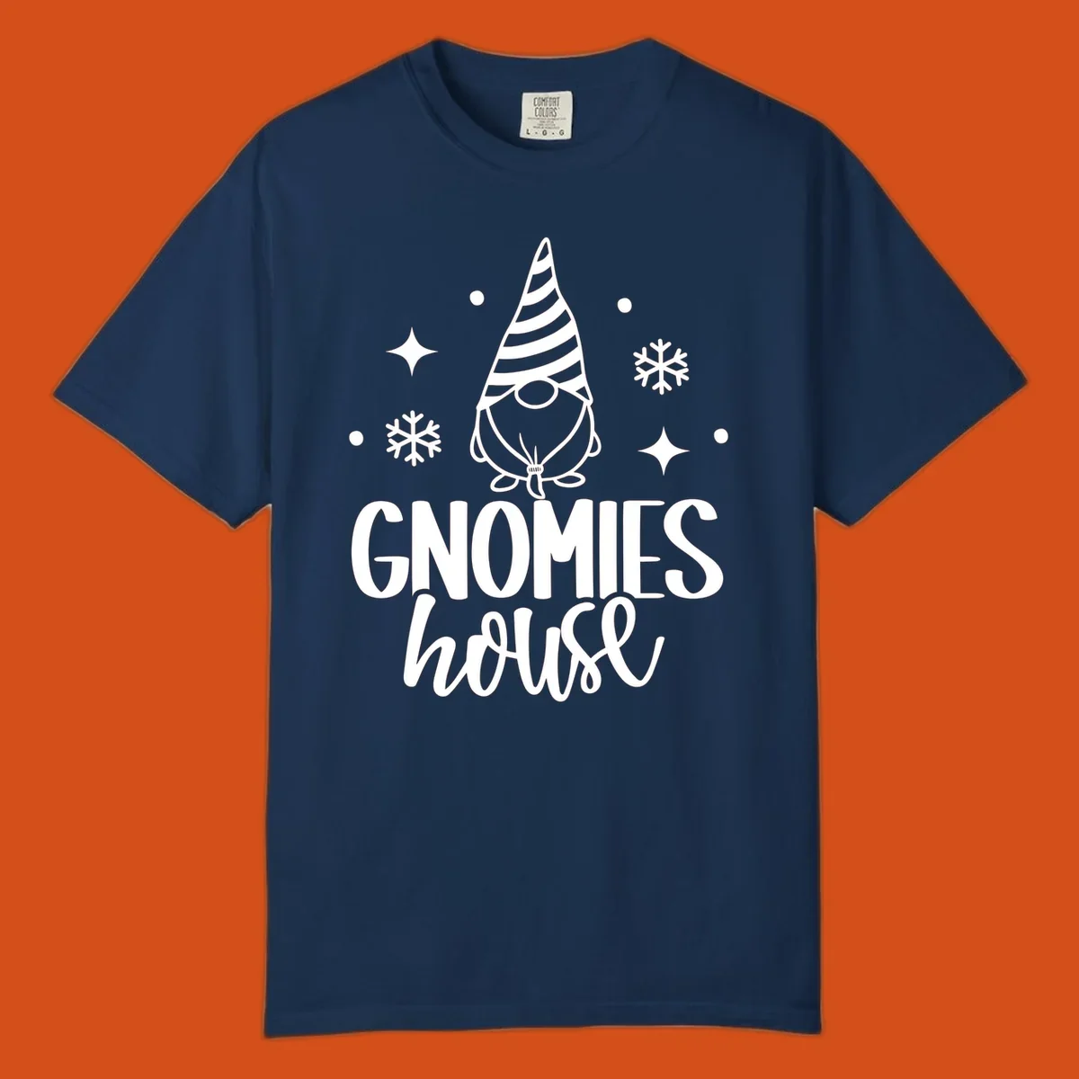 Illustration of a gnome with text 'GNOMIES house', surrounded by winter elements.