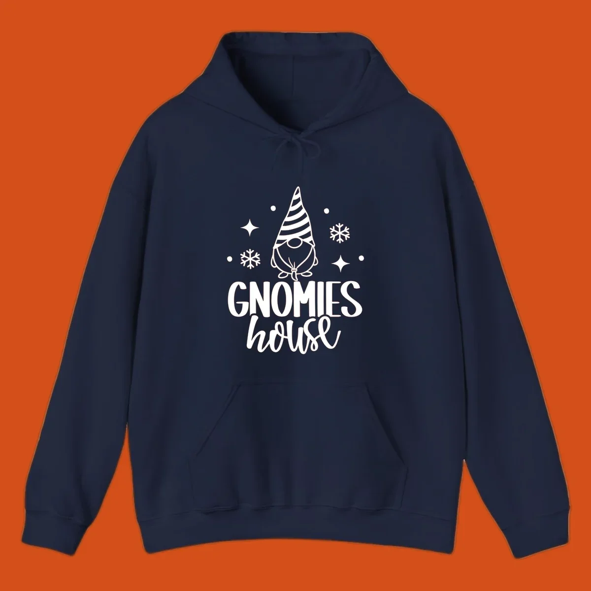 Illustration of a gnome with text 'GNOMIES house', surrounded by winter elements.
