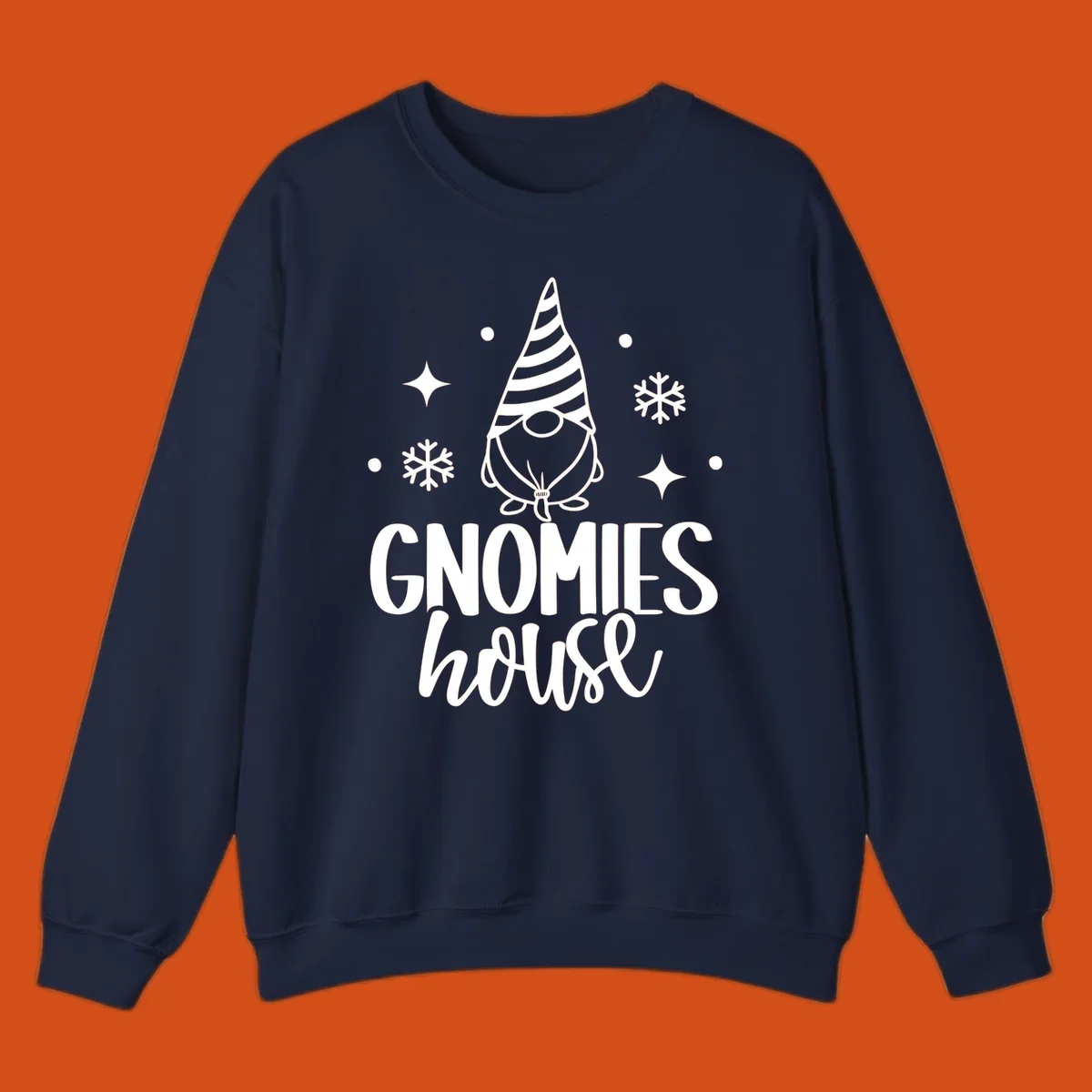 Illustration of a gnome with text 'GNOMIES house', surrounded by winter elements.