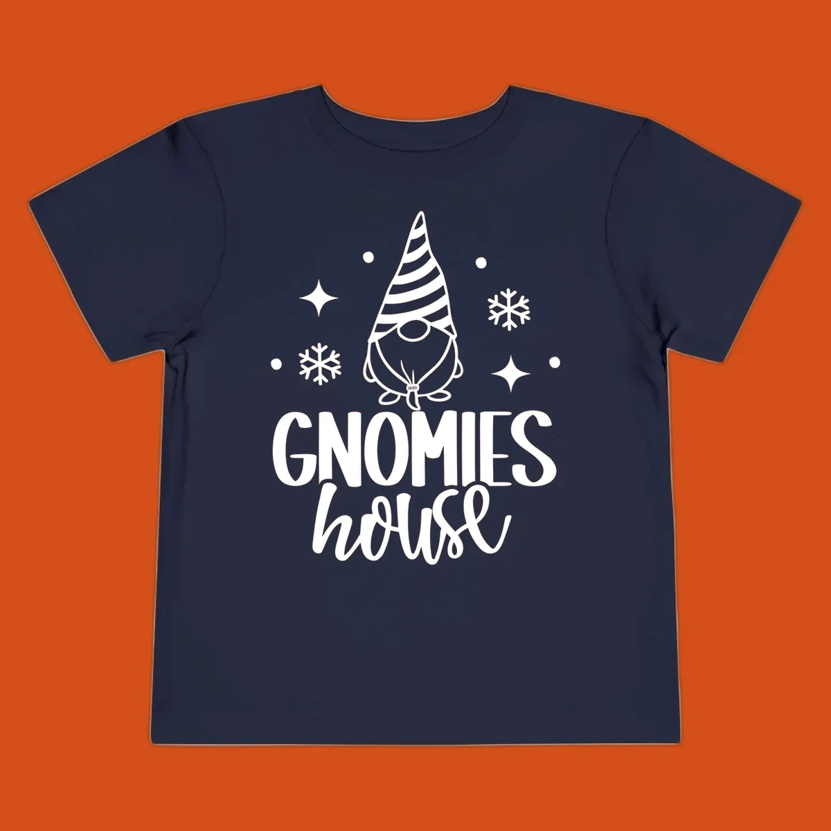 Illustration of a gnome with text 'GNOMIES house', surrounded by winter elements.