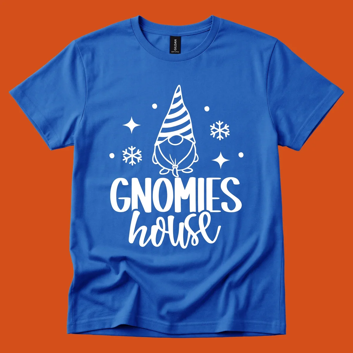 Illustration of a gnome with text 'GNOMIES house', surrounded by winter elements.
