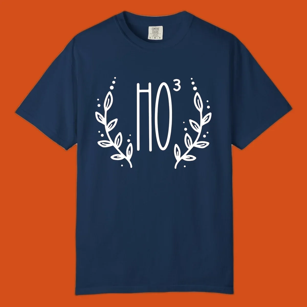 The Holiday Tee logo with stylized text HO³ framed by decorative branches.