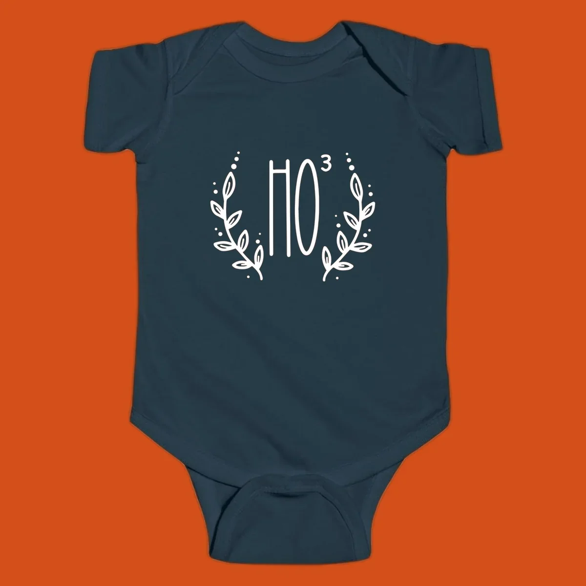 The Holiday Tee logo with stylized text HO³ framed by decorative branches.
