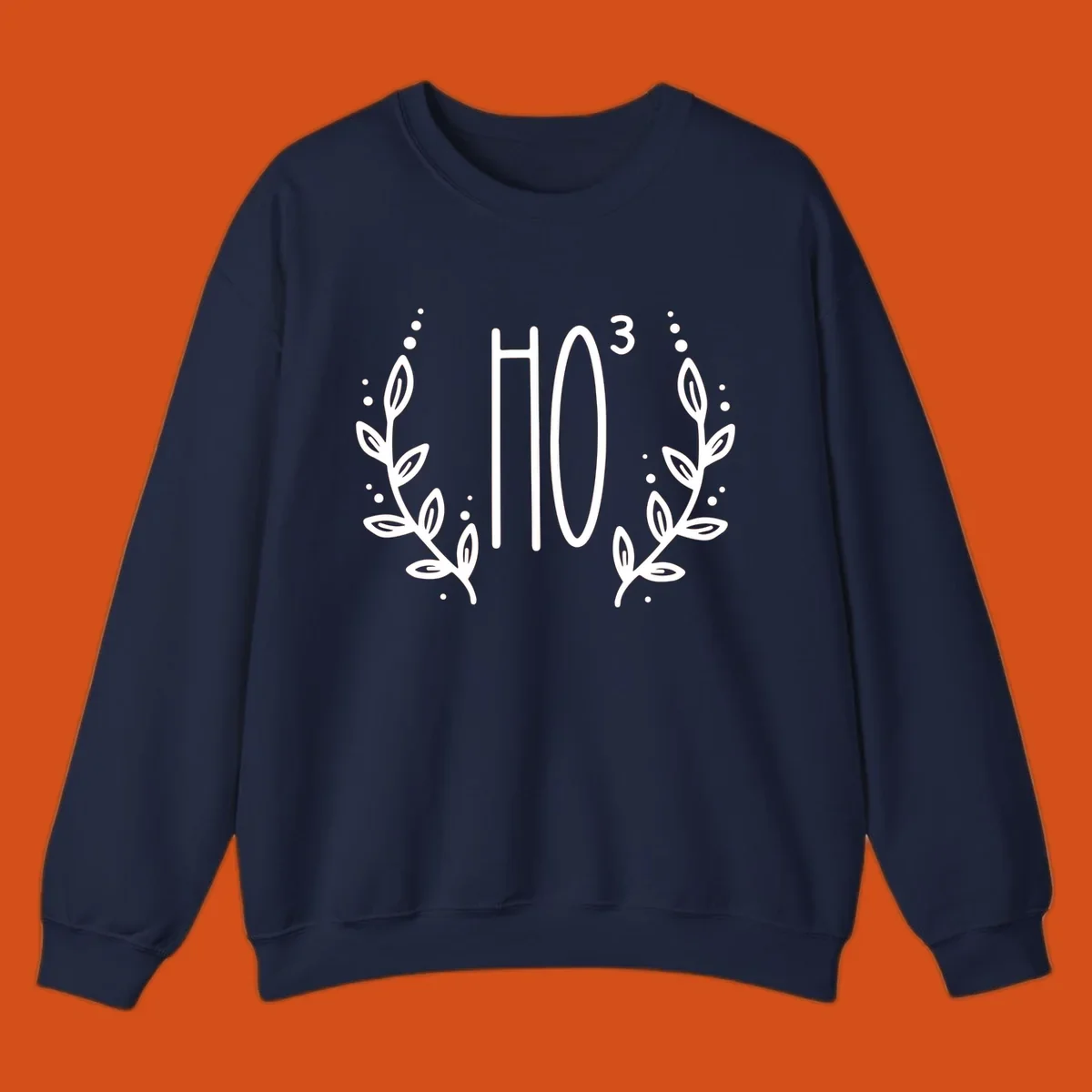 The Holiday Tee logo with stylized text HO³ framed by decorative branches.