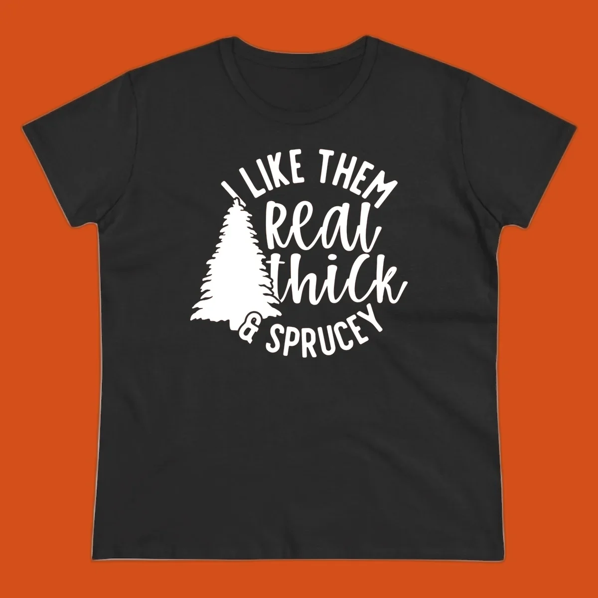 Illustration of a Christmas tree with text 'I like them real thick & sprucey', for thick-sprucey-christmas designs.