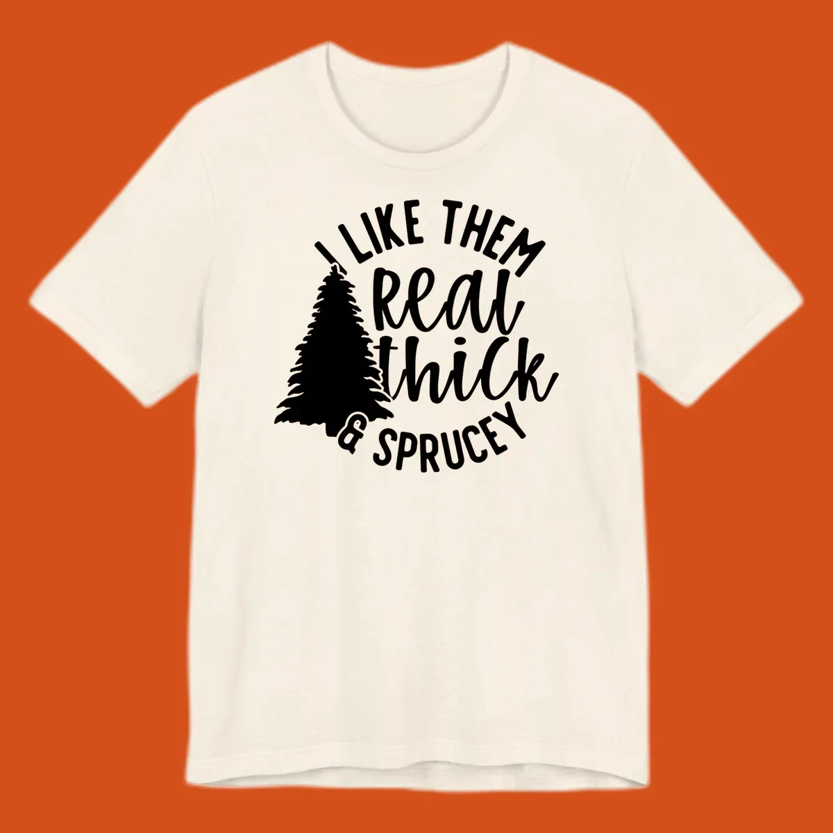 Illustration of a Christmas tree with text 'I like them real thick & sprucey', for thick-sprucey-christmas designs.