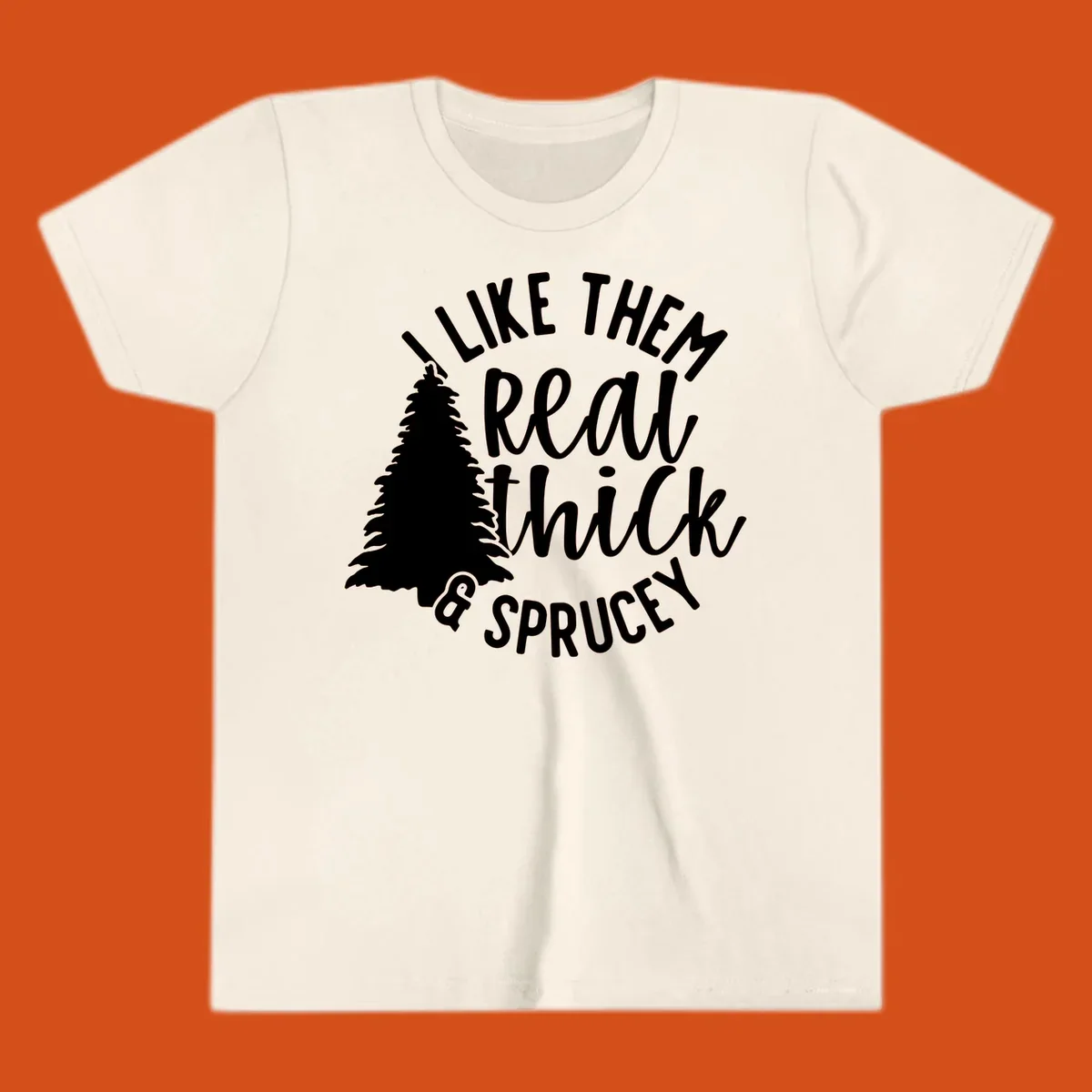Illustration of a Christmas tree with text 'I like them real thick & sprucey', for thick-sprucey-christmas designs.
