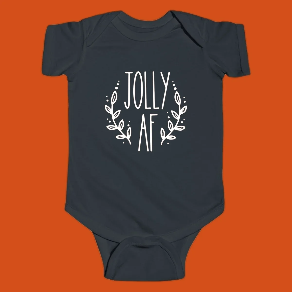 Jolly AF Christmas wreath design with text and leaves.