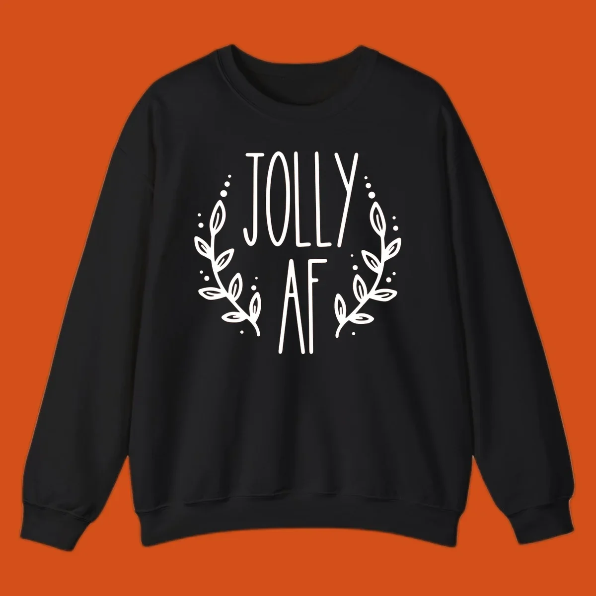 Jolly AF Christmas wreath design with text and leaves.