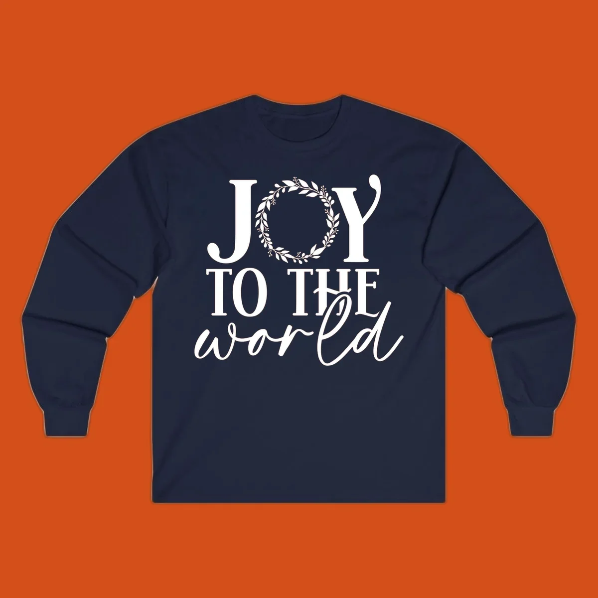 Joy to the World Christmas text design with a wreath replacing the letter O. White text on black background.