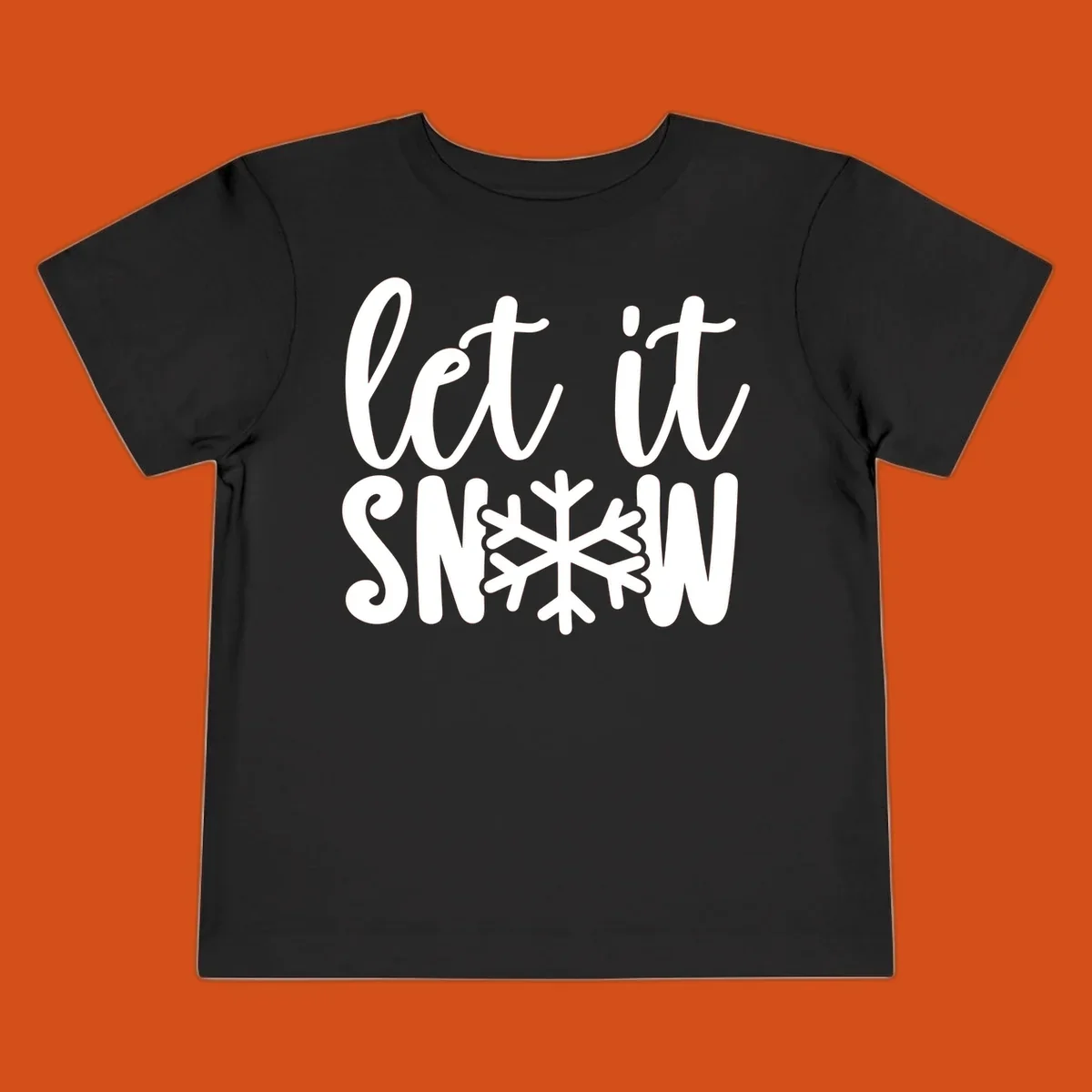 Let it snow text with a snowflake graphic, holiday design