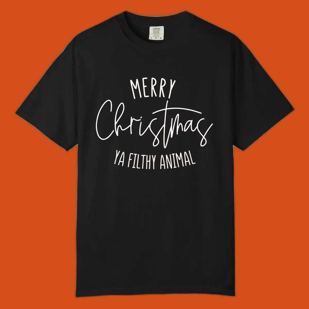 Merry Christmas Ya Filthy Animal text design in white, handwritten-style font.