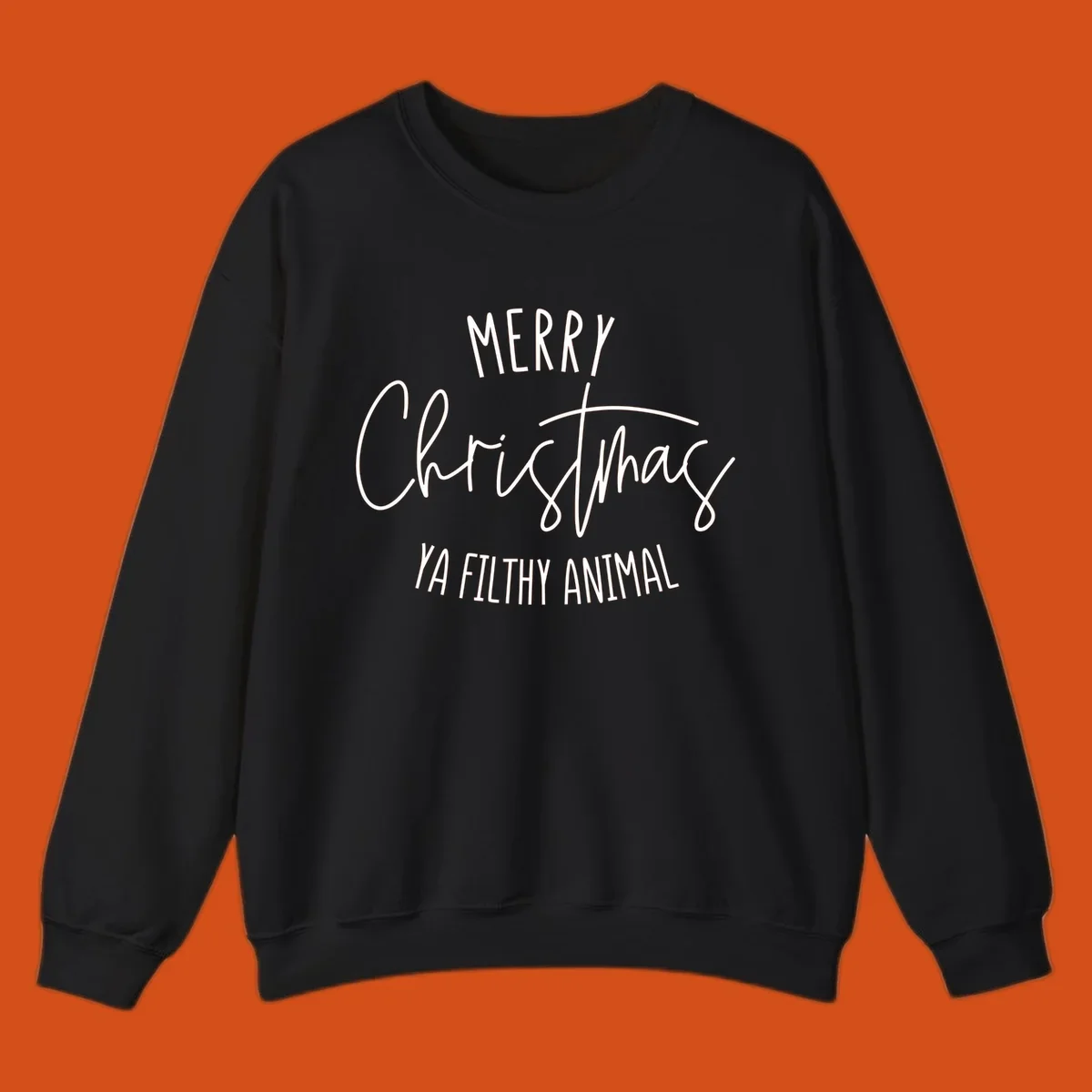 Merry Christmas Ya Filthy Animal text design in white, handwritten-style font.