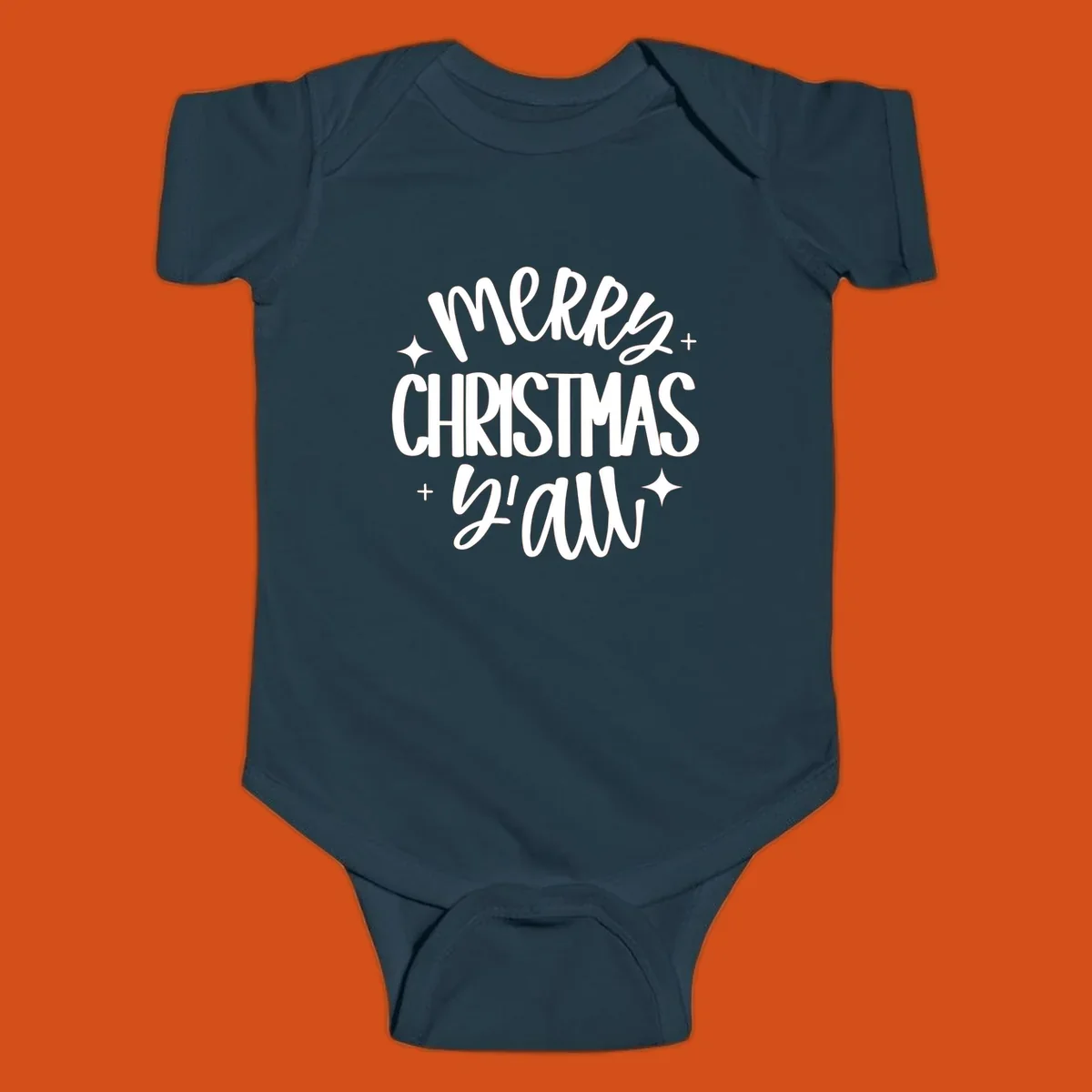 Merry Christmas Y'all hand lettered design with star accents.