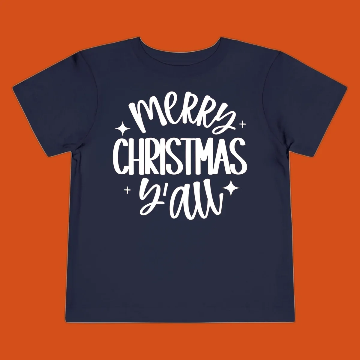 Merry Christmas Y'all hand lettered design with star accents.
