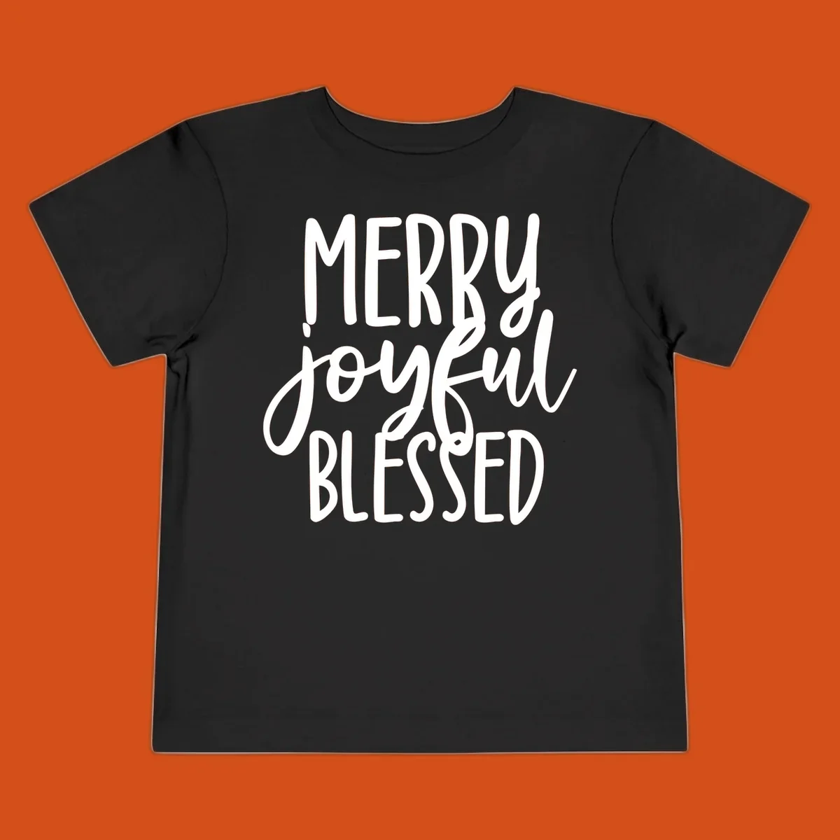Merry Joyful Blessed holiday typography design with white text on a black background.