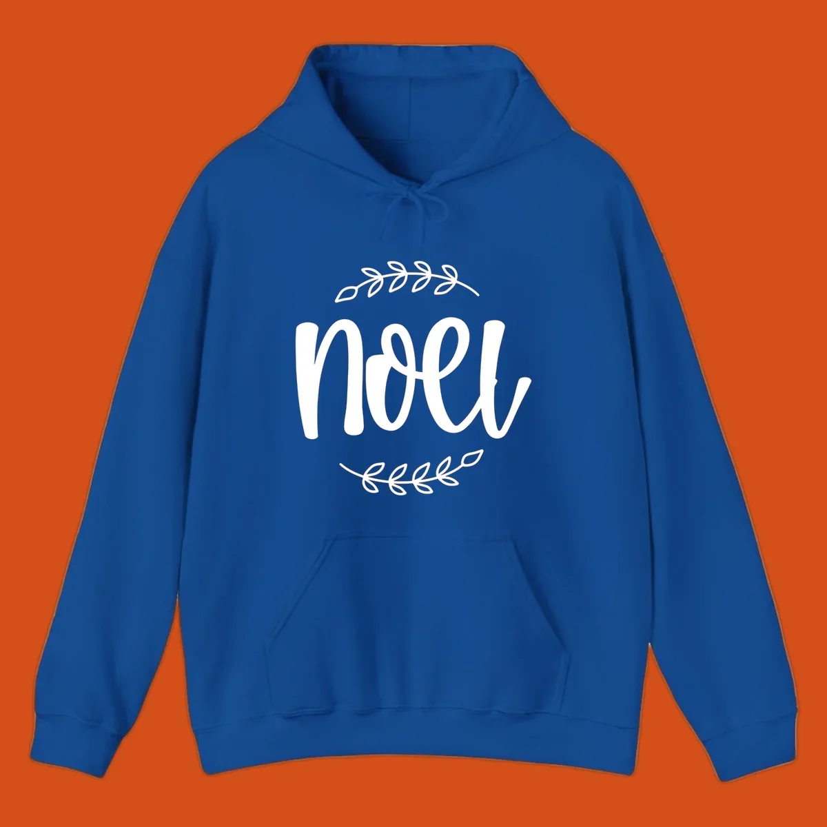 Elegant christmas noel script with leafy branches.