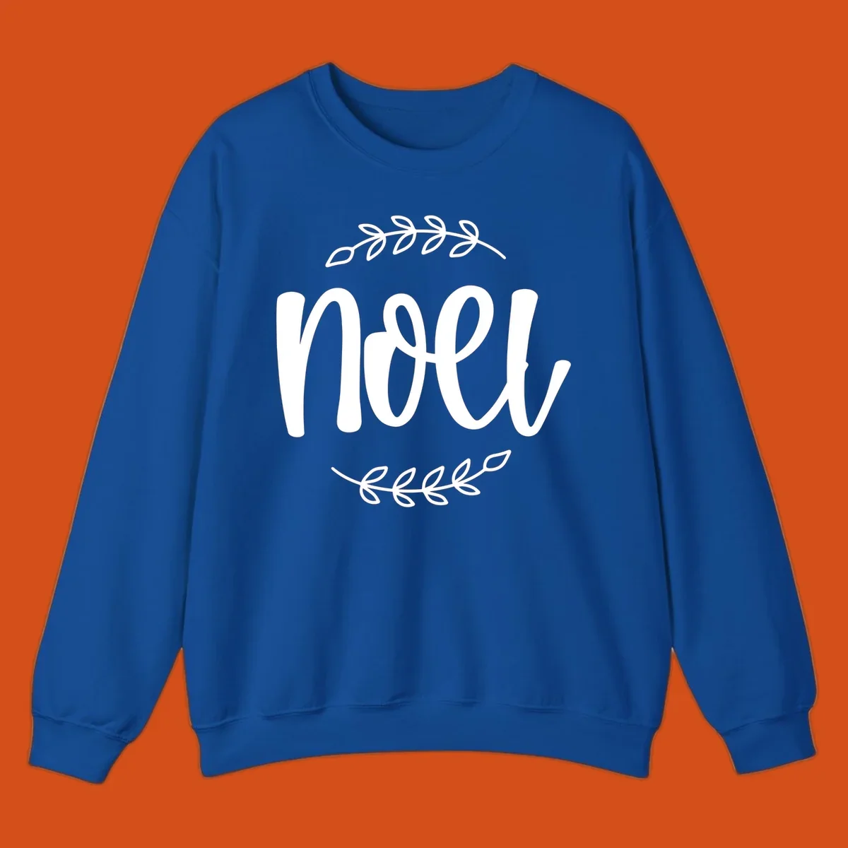 Elegant christmas noel script with leafy branches.