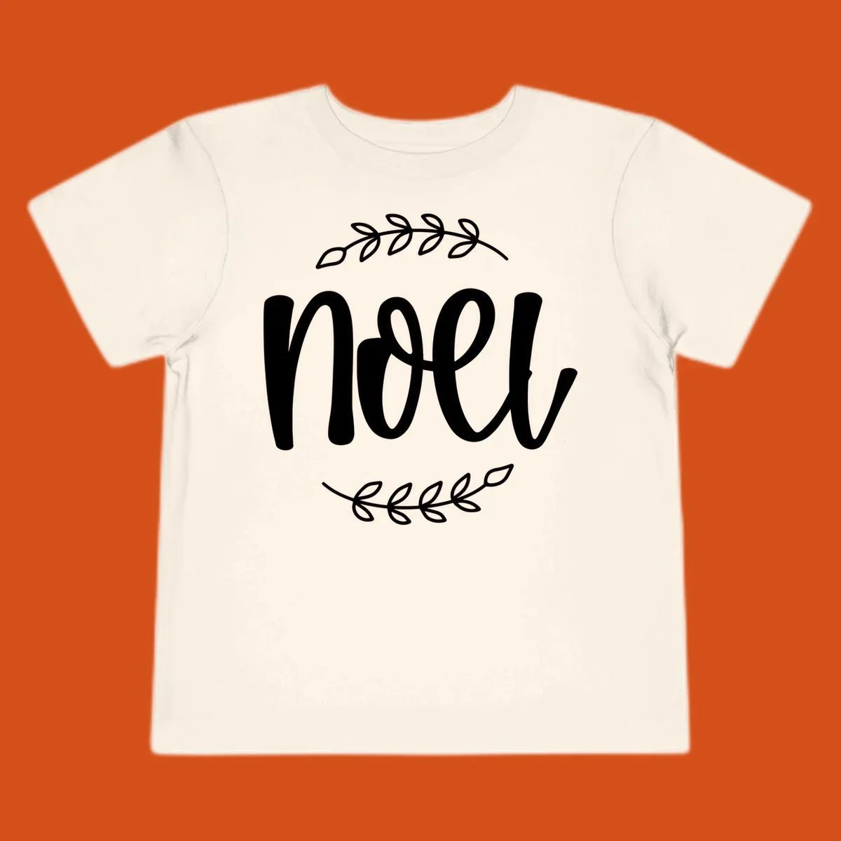 Elegant christmas noel script with leafy branches.