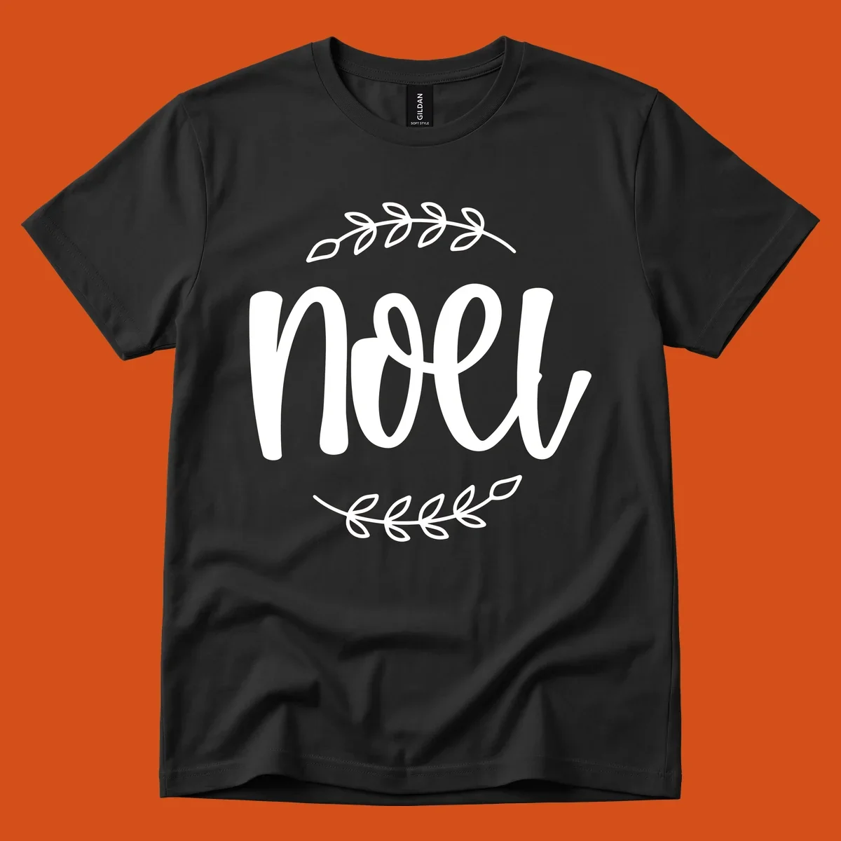 Elegant christmas noel script with leafy branches.