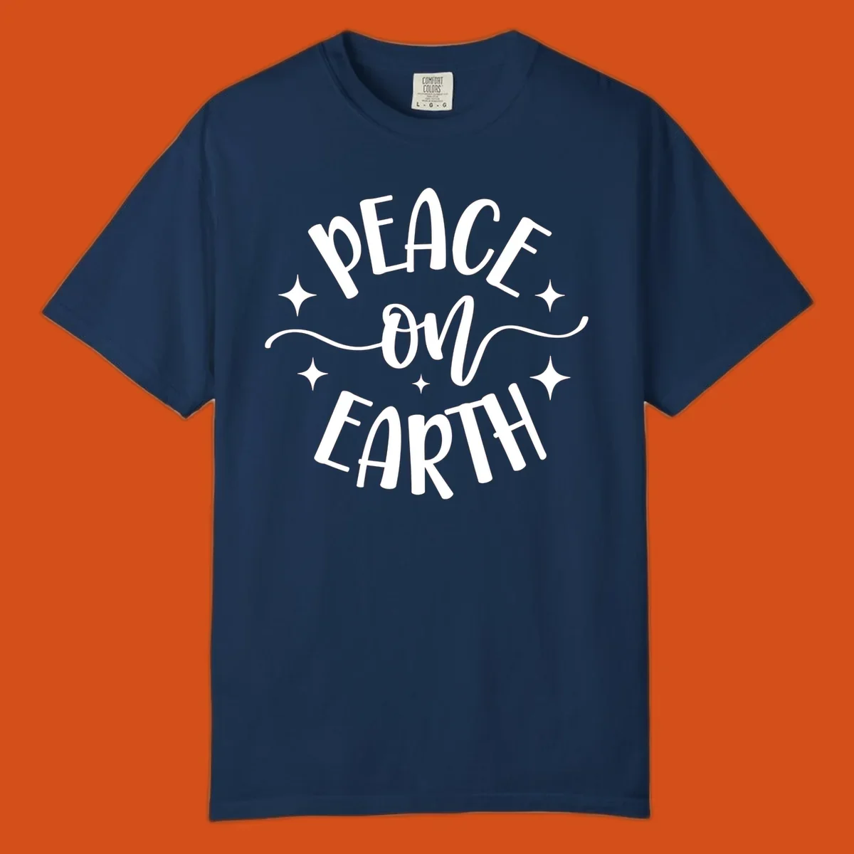 Peace on Earth holiday typography design with stars and swirls.