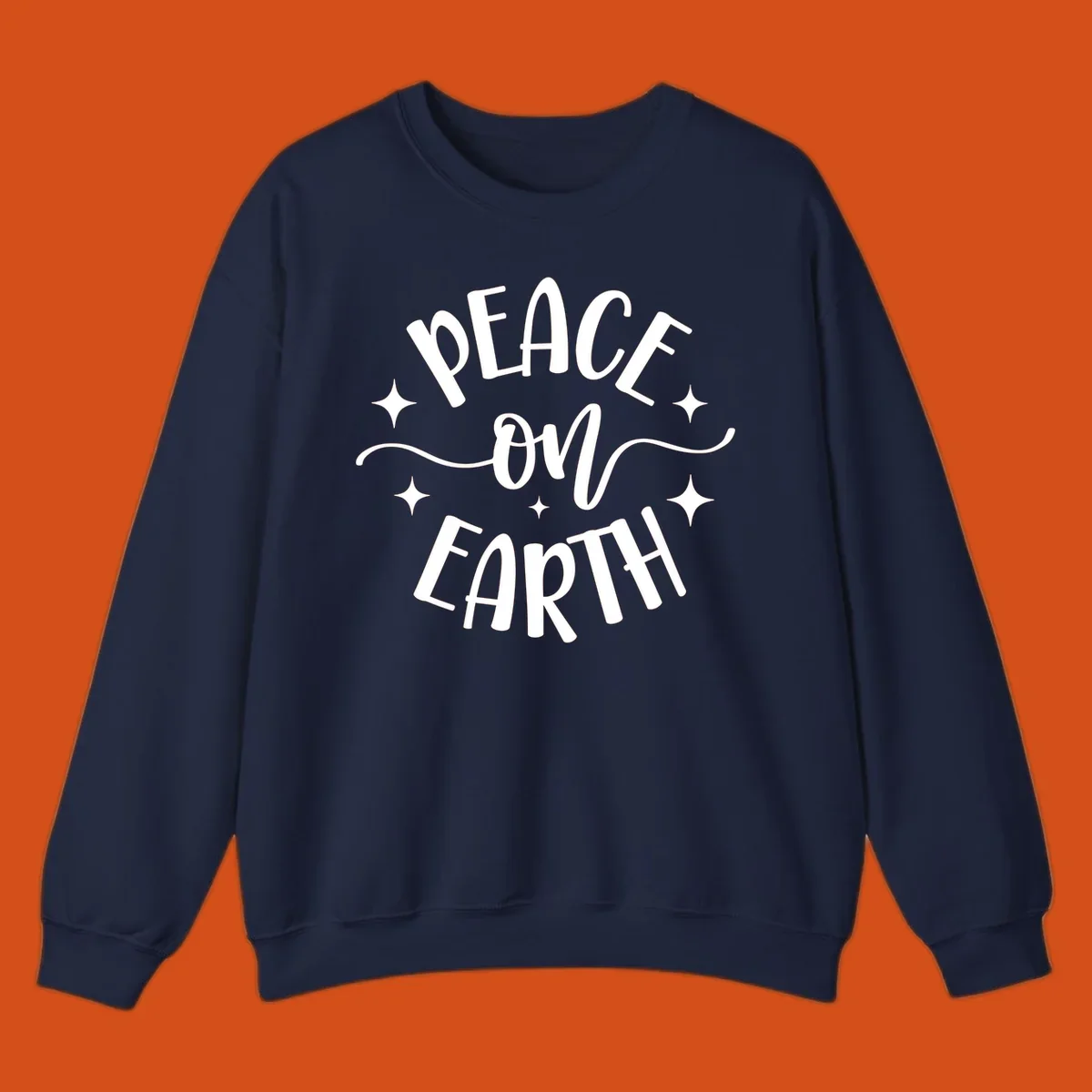 Peace on Earth holiday typography design with stars and swirls.