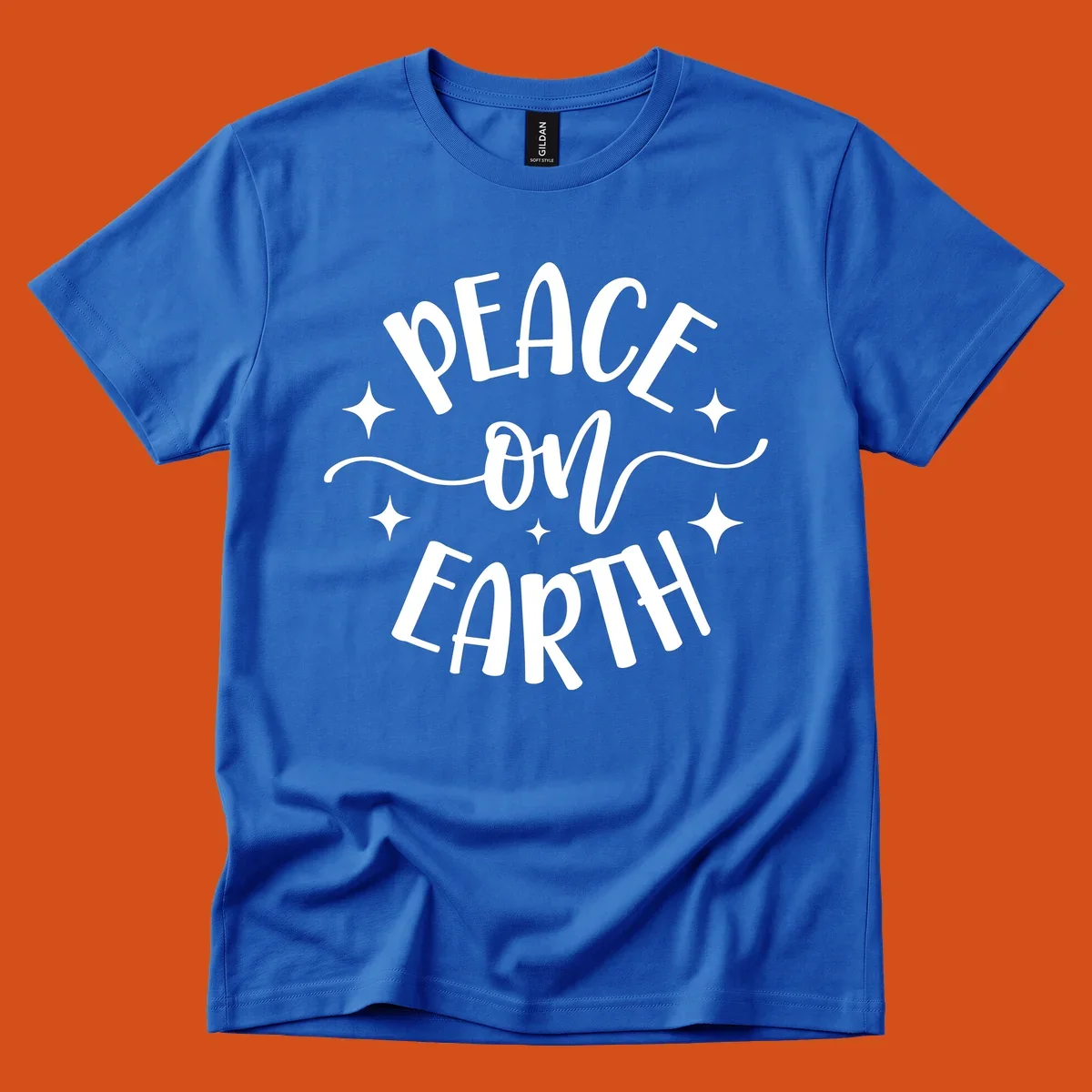 Peace on Earth holiday typography design with stars and swirls.