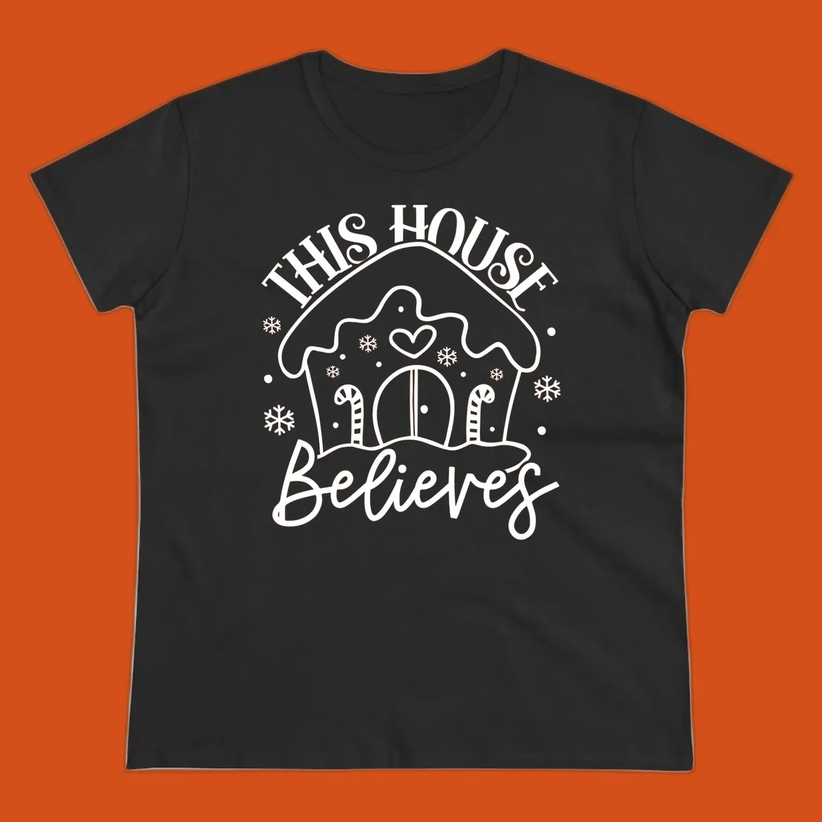 Gingerbread house graphic with 'This House Believes' text for Christmas.