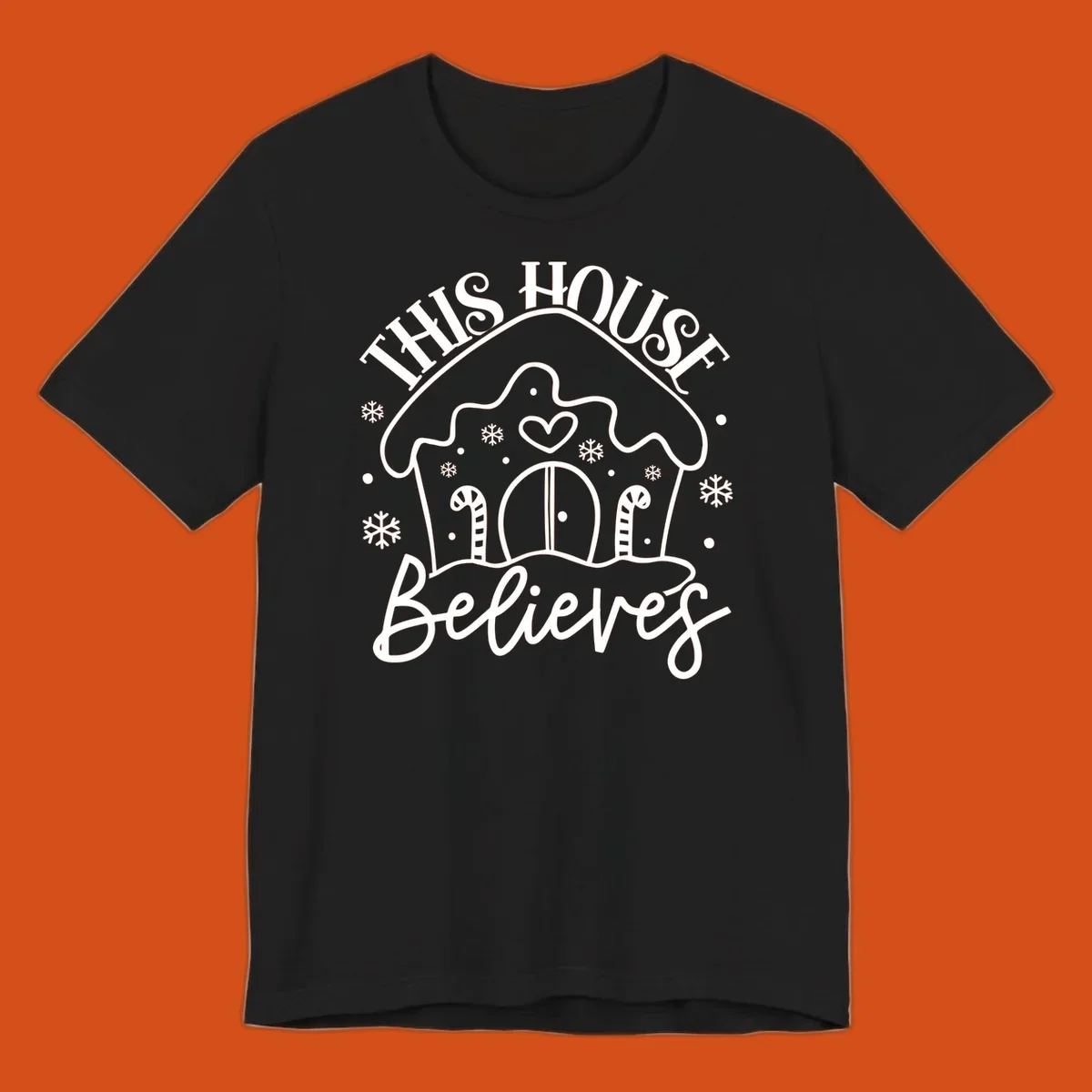 Gingerbread house graphic with 'This House Believes' text for Christmas.