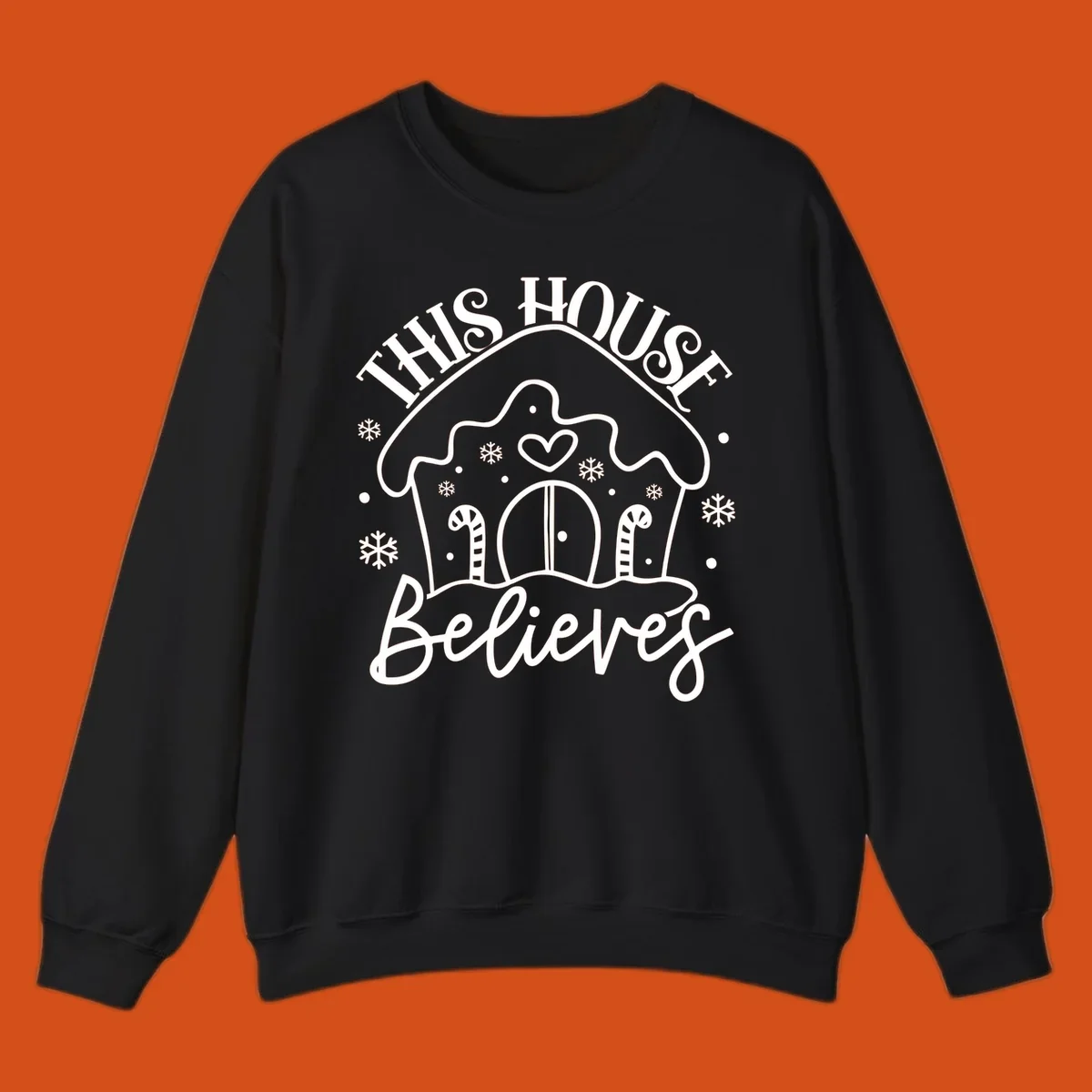 Gingerbread house graphic with 'This House Believes' text for Christmas.