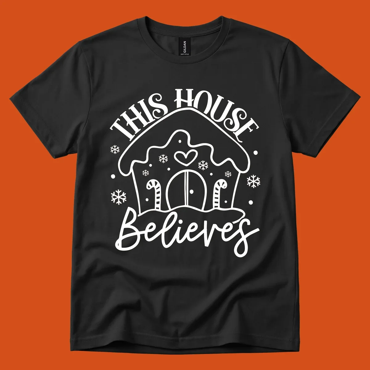 Gingerbread house graphic with 'This House Believes' text for Christmas.