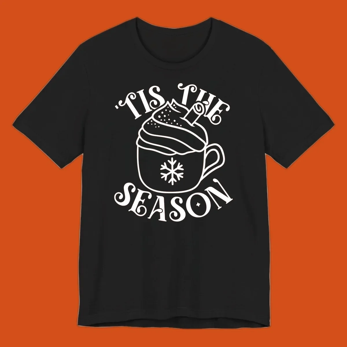 Tis the season hot cocoa mug with snowflake and cinnamon stick, white design on black.