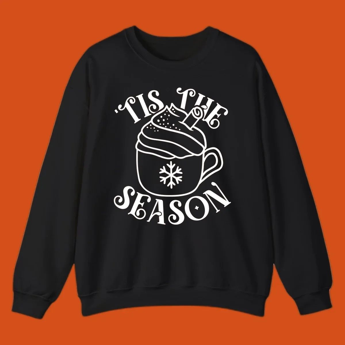 Tis the season hot cocoa mug with snowflake and cinnamon stick, white design on black.