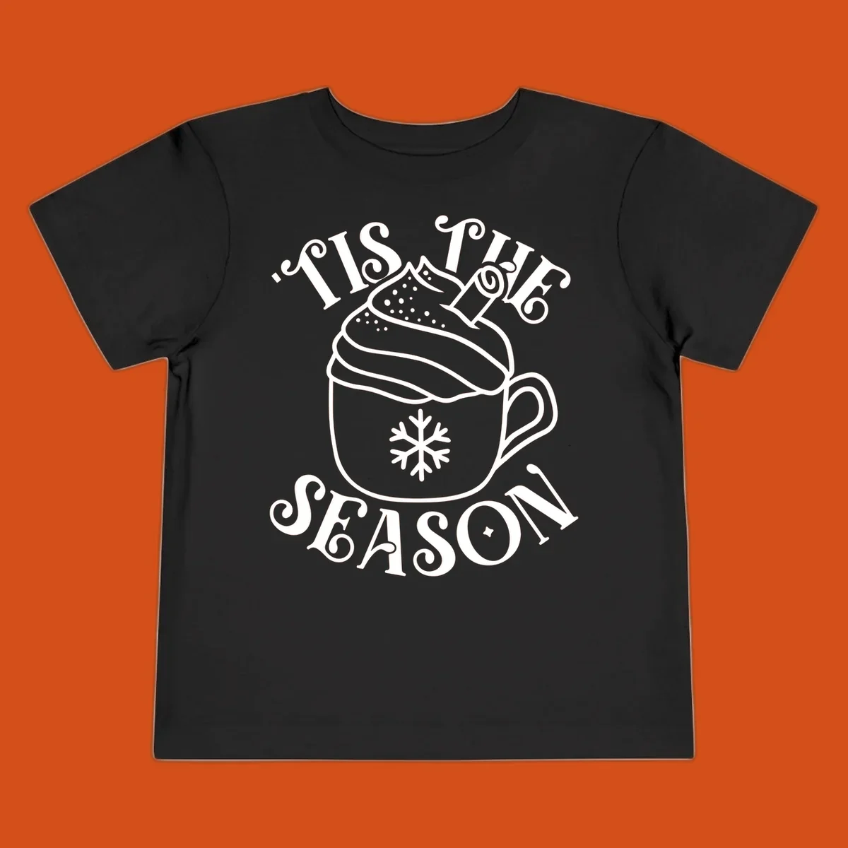Tis the season hot cocoa mug with snowflake and cinnamon stick, white design on black.